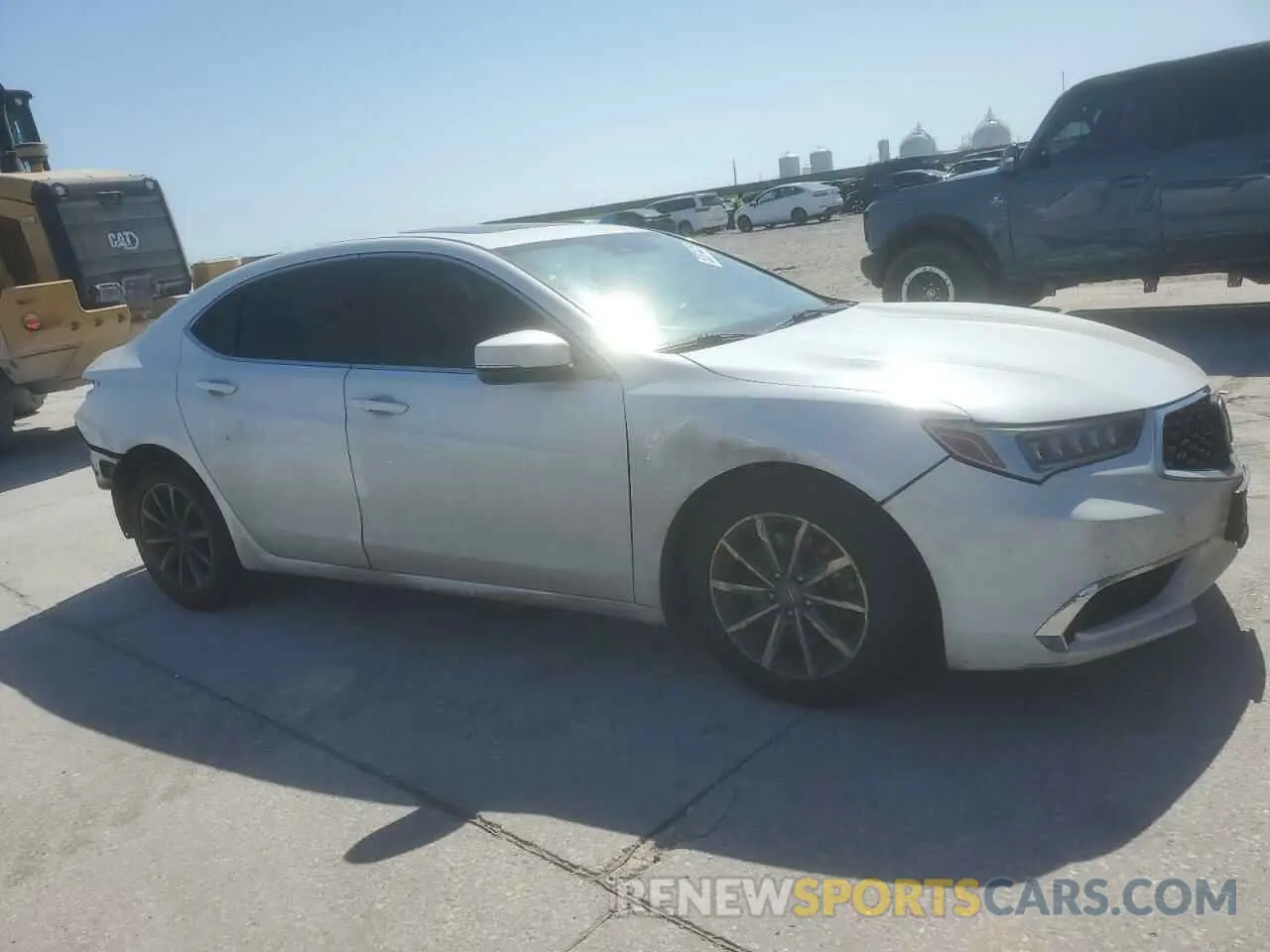 4 Photograph of a damaged car 19UUB1F38LA005157 ACURA TLX 2020