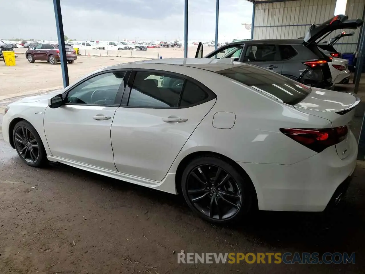 2 Photograph of a damaged car 19UUB1F63LA009904 ACURA TLX 2020
