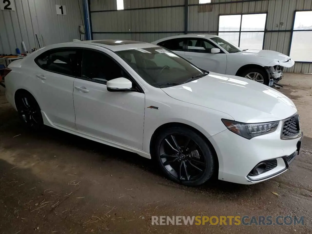 4 Photograph of a damaged car 19UUB1F63LA009904 ACURA TLX 2020