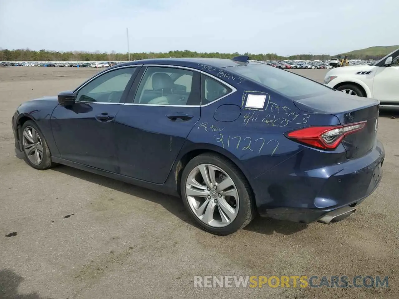2 Photograph of a damaged car 19UUB5F40MA010760 ACURA TLX 2021