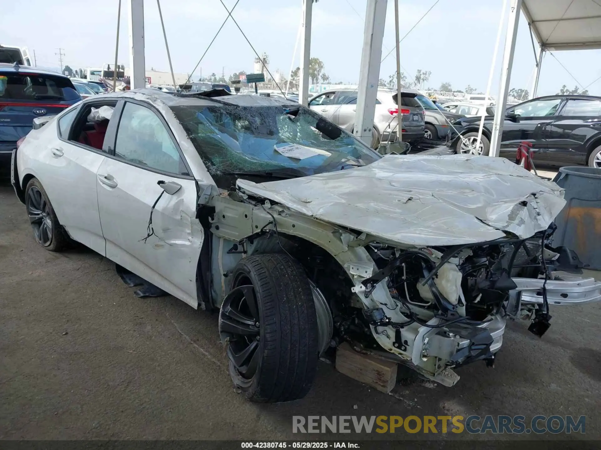 1 Photograph of a damaged car 19UUB5F51MA017032 ACURA TLX 2021
