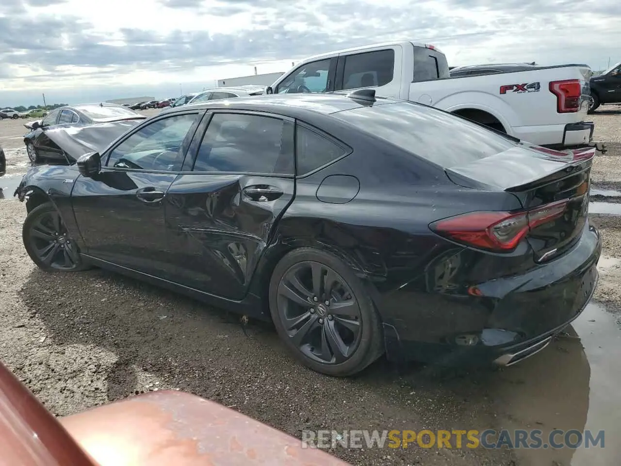 2 Photograph of a damaged car 19UUB6F59MA011419 ACURA TLX 2021