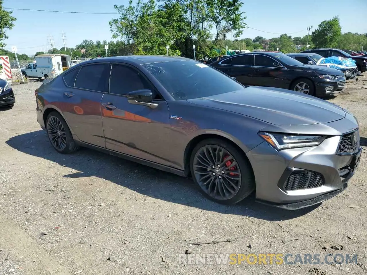 4 Photograph of a damaged car 19UUB7F09MA000379 ACURA TLX 2021