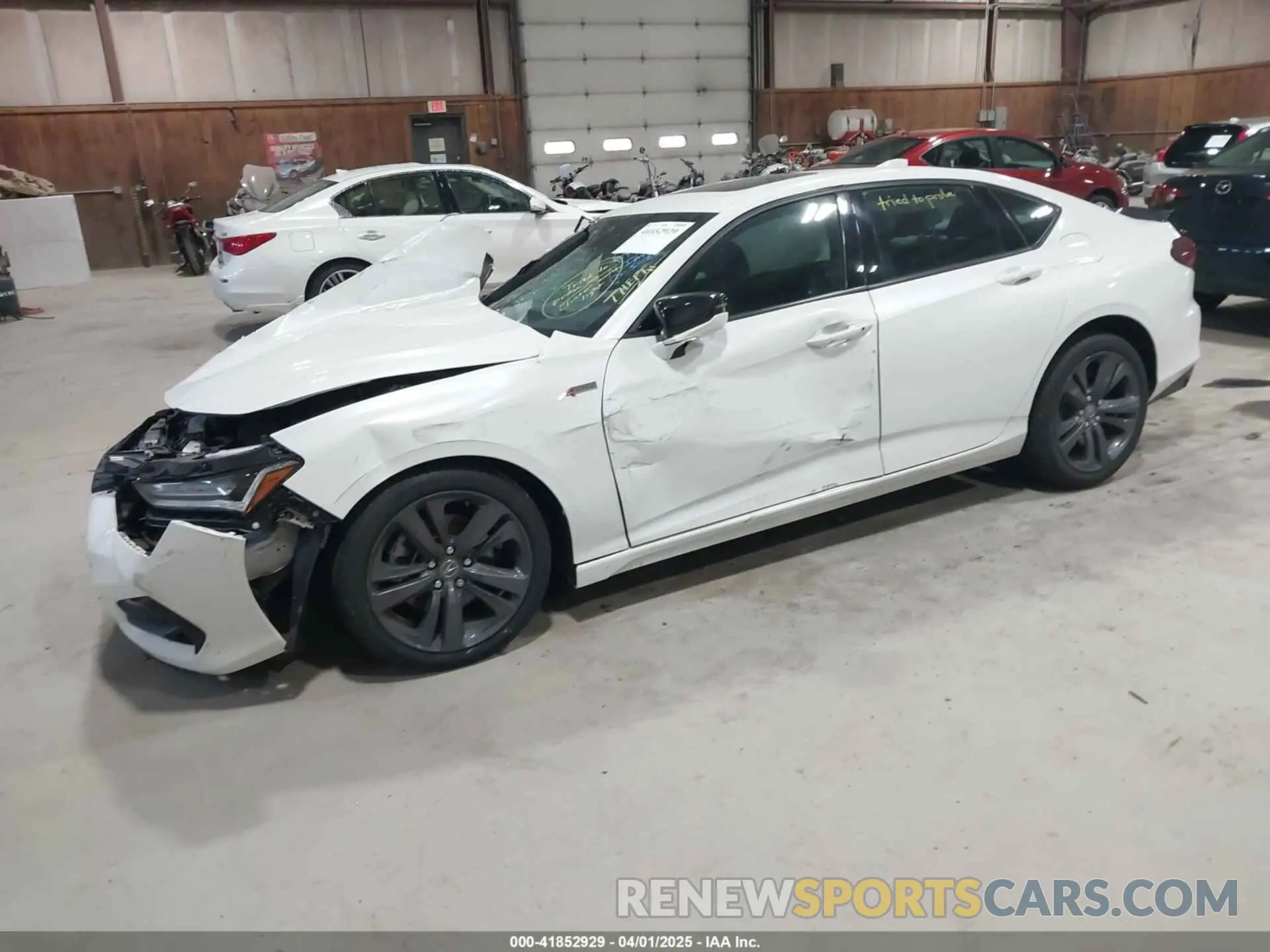 2 Photograph of a damaged car 19UUB6F57NA001635 ACURA TLX 2022