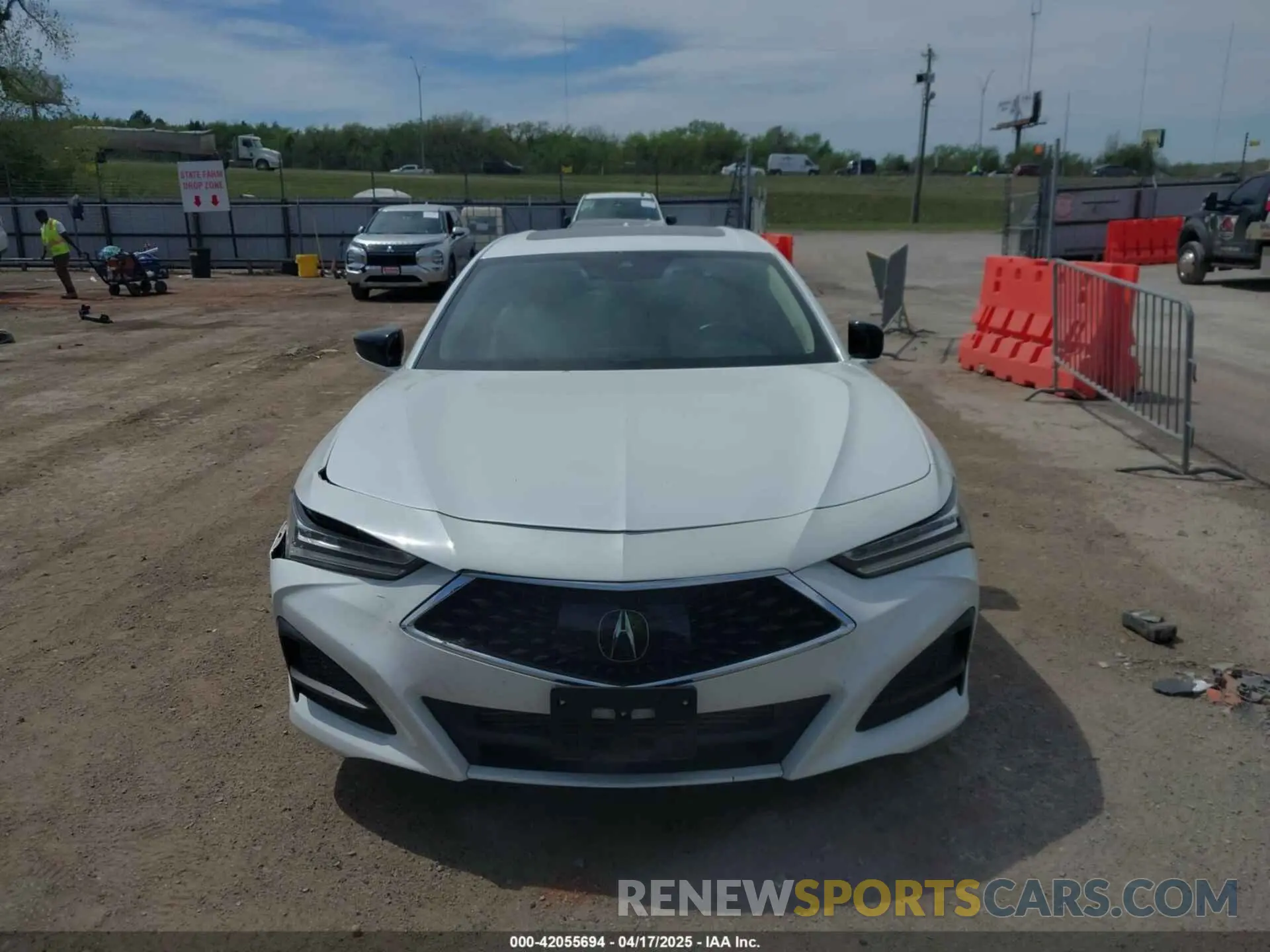 12 Photograph of a damaged car 19UUB5F46PA002053 ACURA TLX 2023