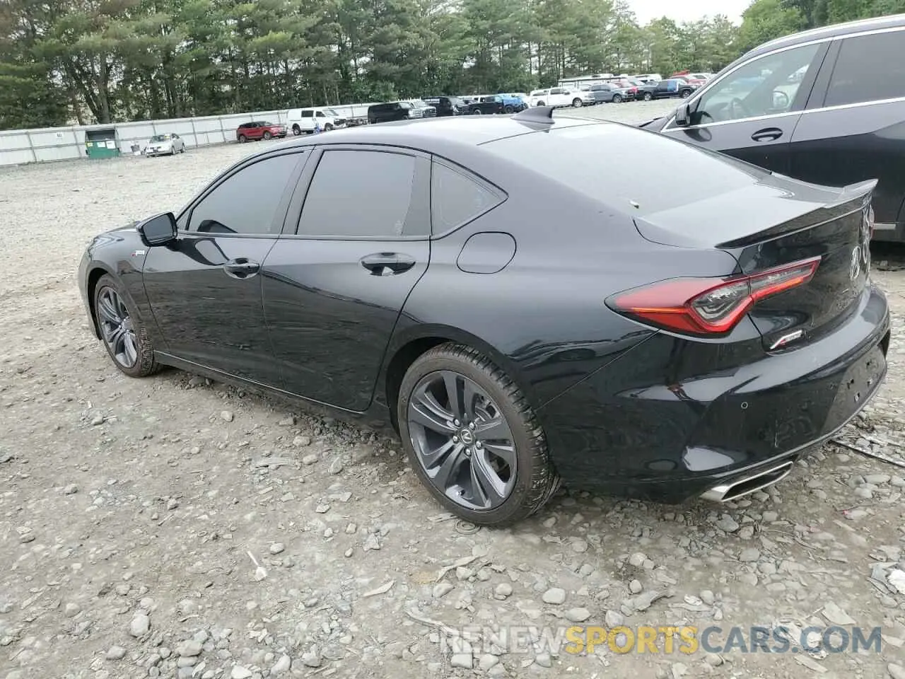 2 Photograph of a damaged car 19UUB5F50PA006575 ACURA TLX 2023