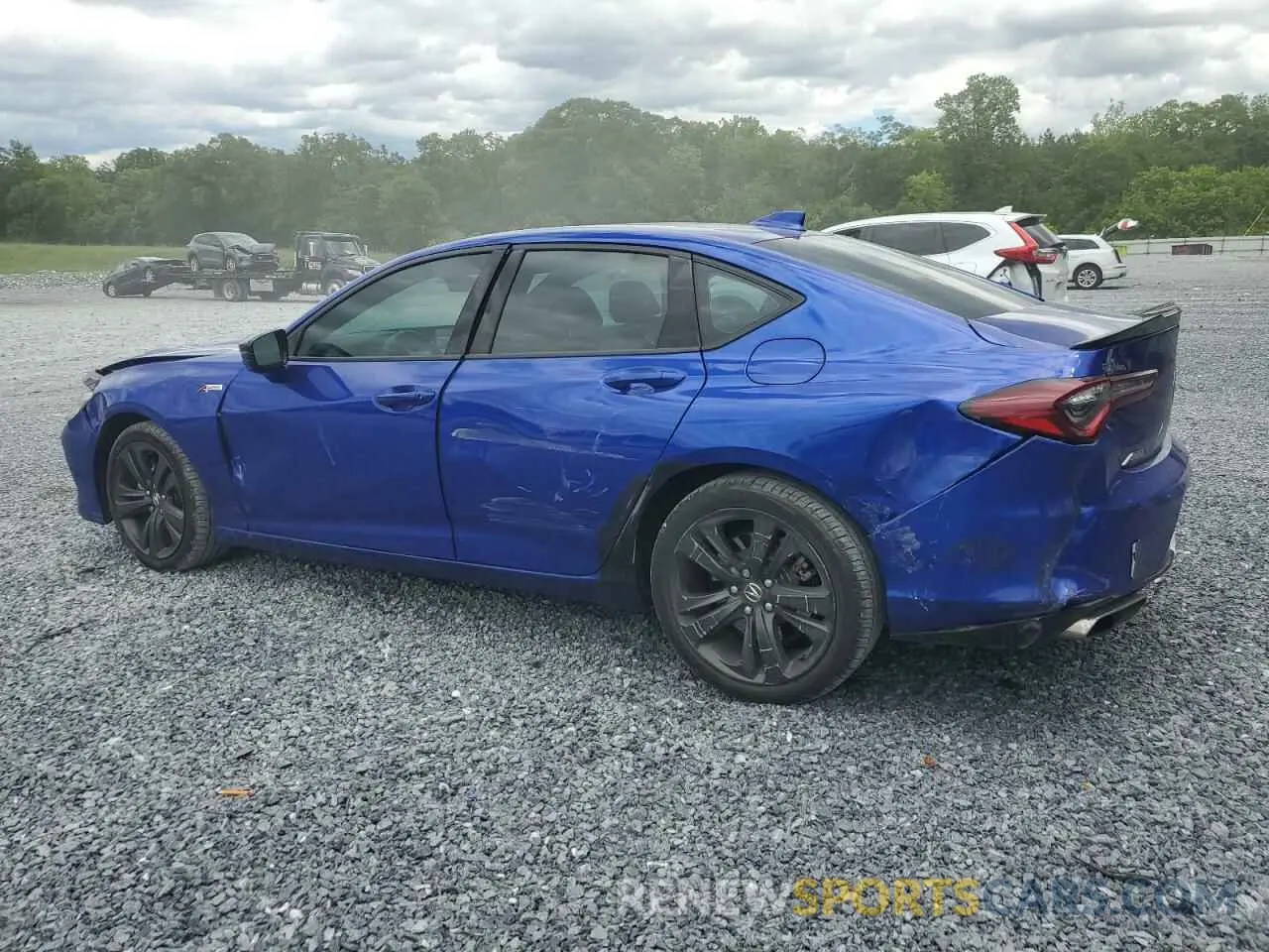 2 Photograph of a damaged car 19UUB6F52PA002811 ACURA TLX 2023