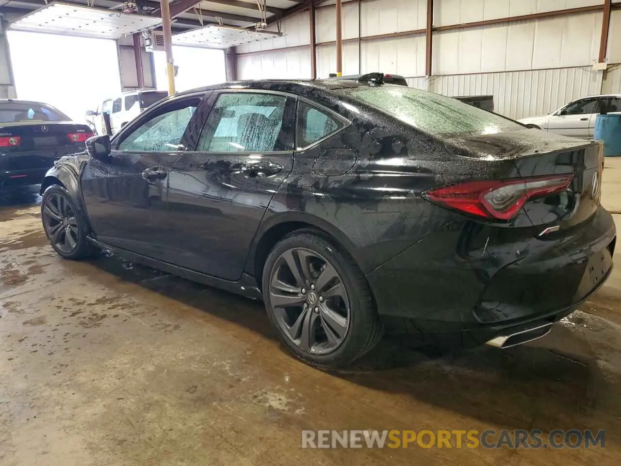 2 Photograph of a damaged car 19UUB6F5XPA001177 ACURA TLX 2023