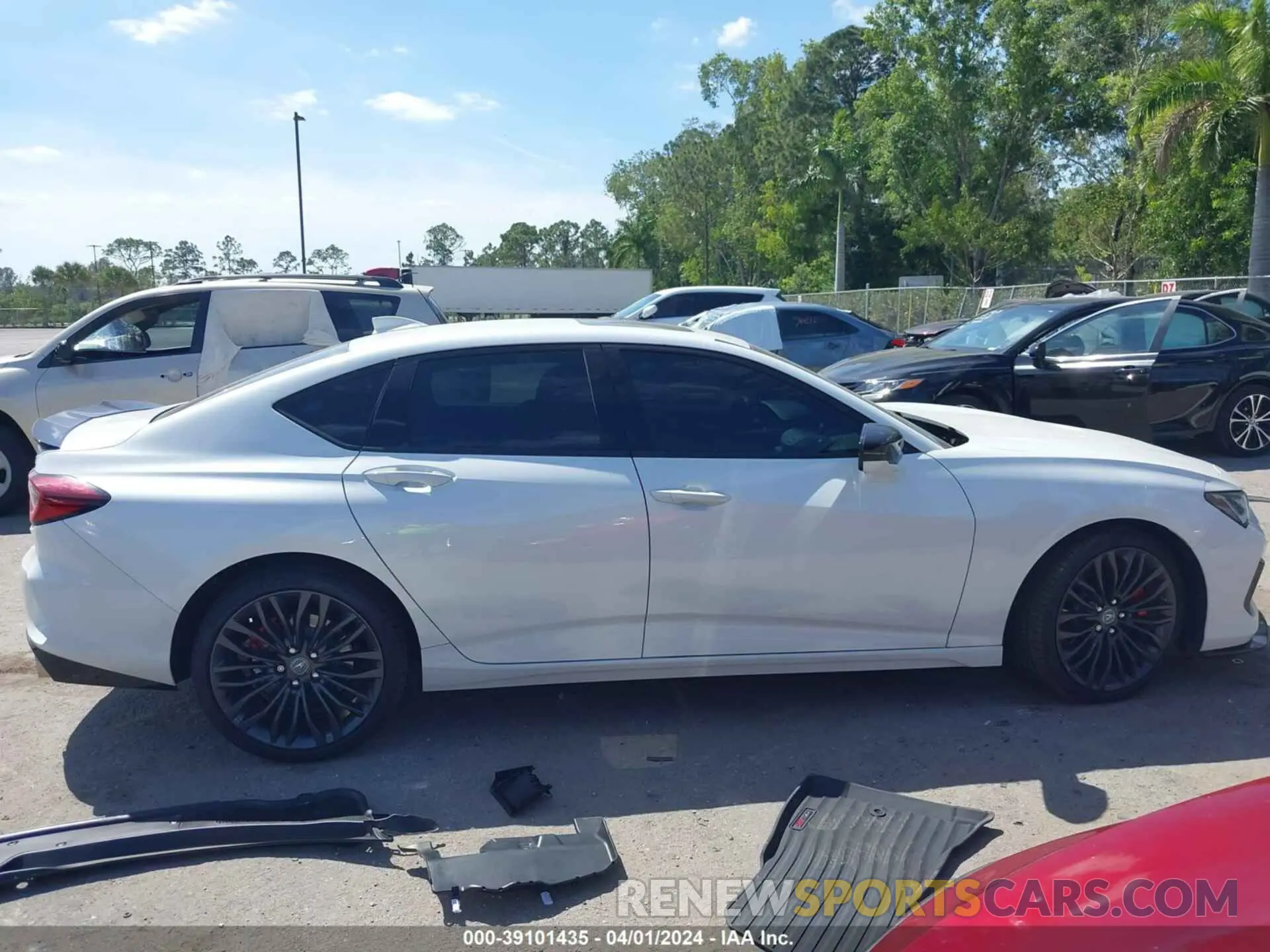 13 Photograph of a damaged car 19UUB7F00PA002221 ACURA TLX 2023
