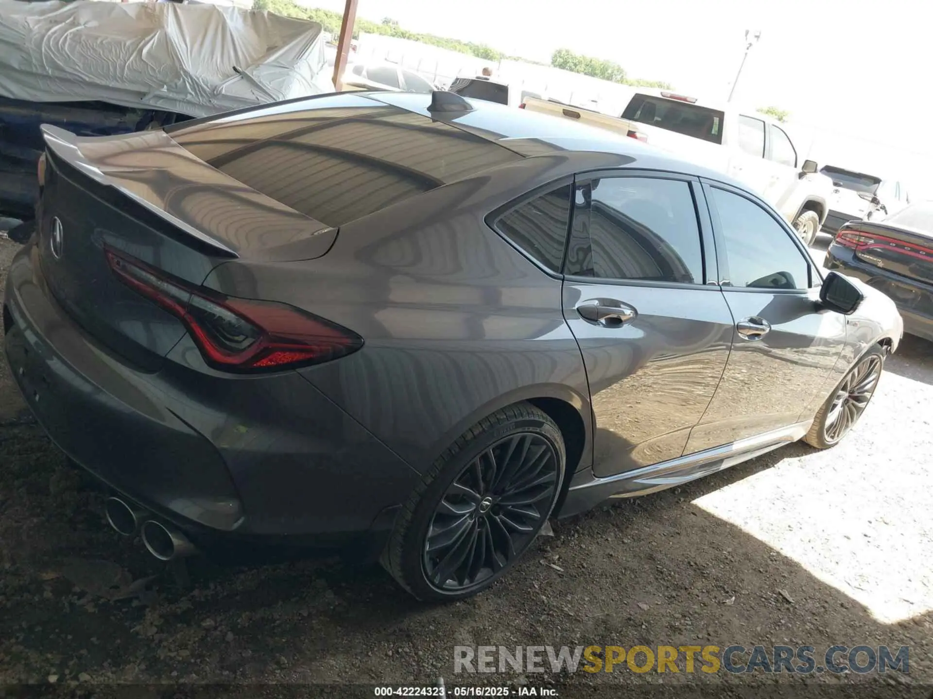 14 Photograph of a damaged car 19UUB7F01PA001899 ACURA TLX 2023
