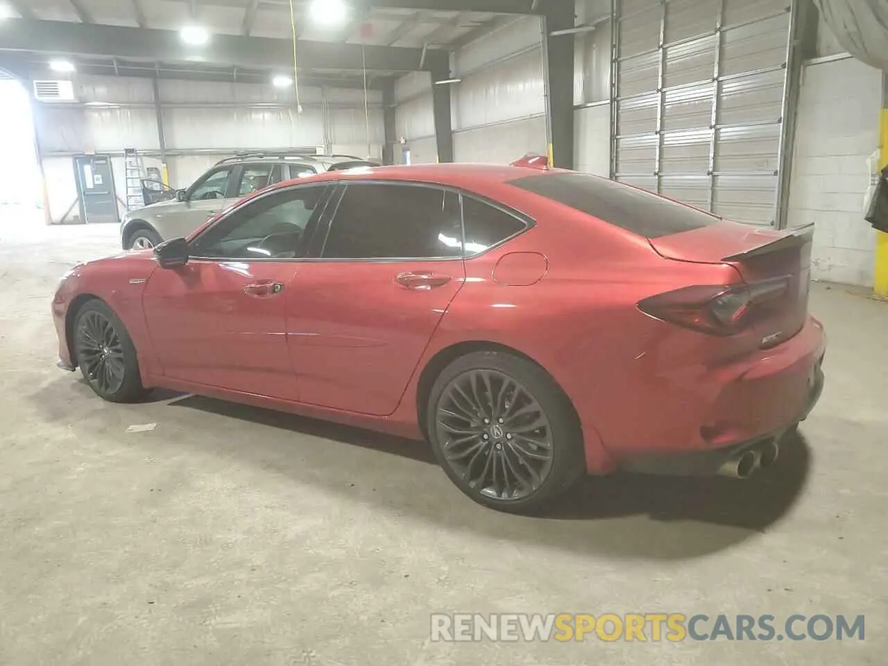 2 Photograph of a damaged car 19UUB7F06PA003888 ACURA TLX 2023