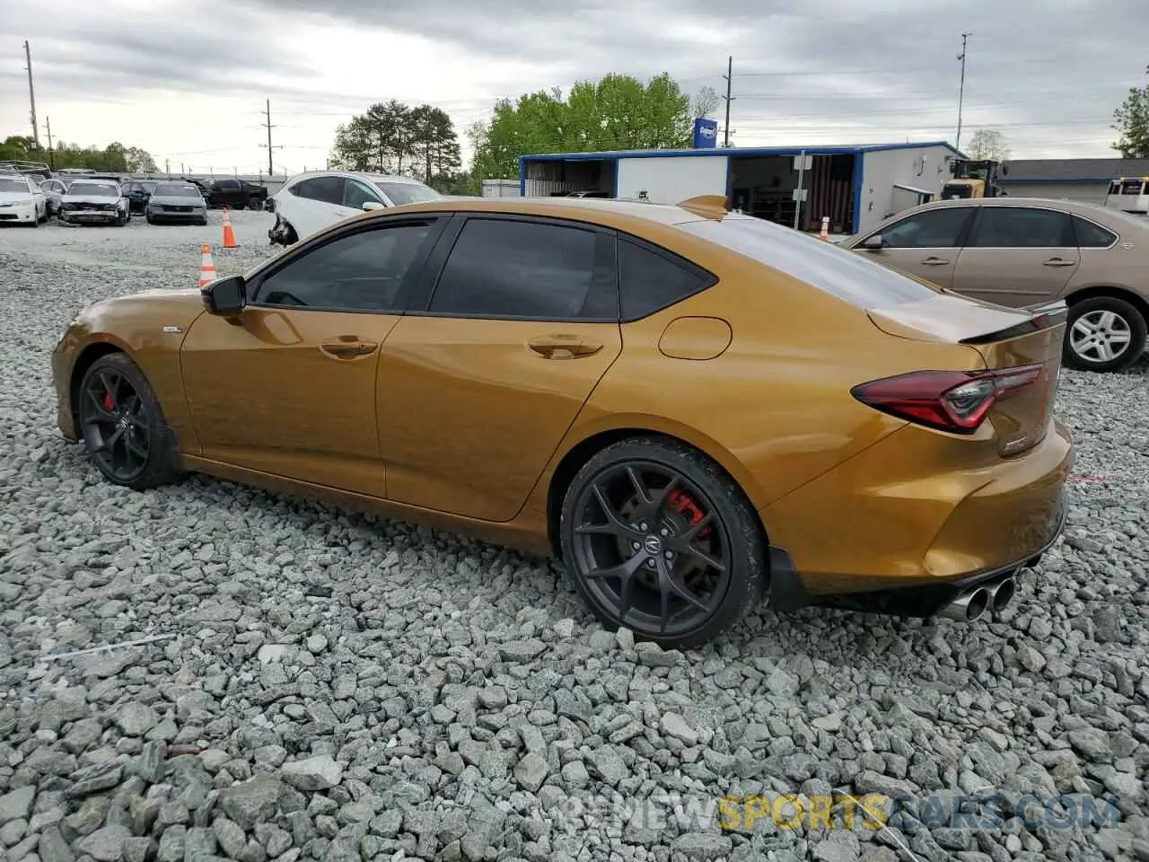 2 Photograph of a damaged car 19UUB7F92PA002624 ACURA TLX 2023