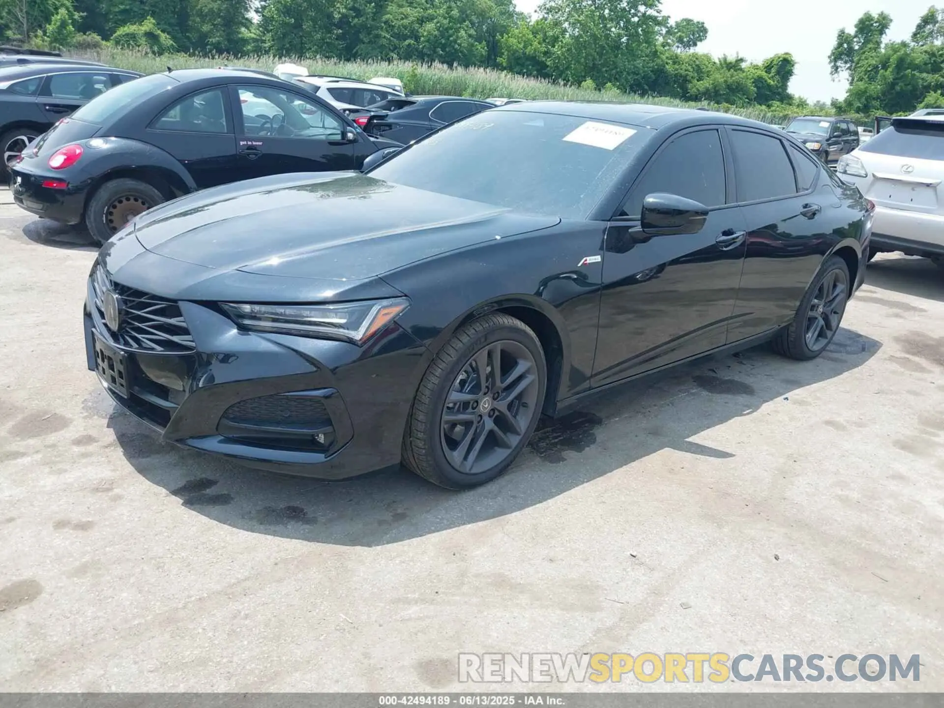 2 Photograph of a damaged car 19UUB6F52RA001032 ACURA TLX 2024