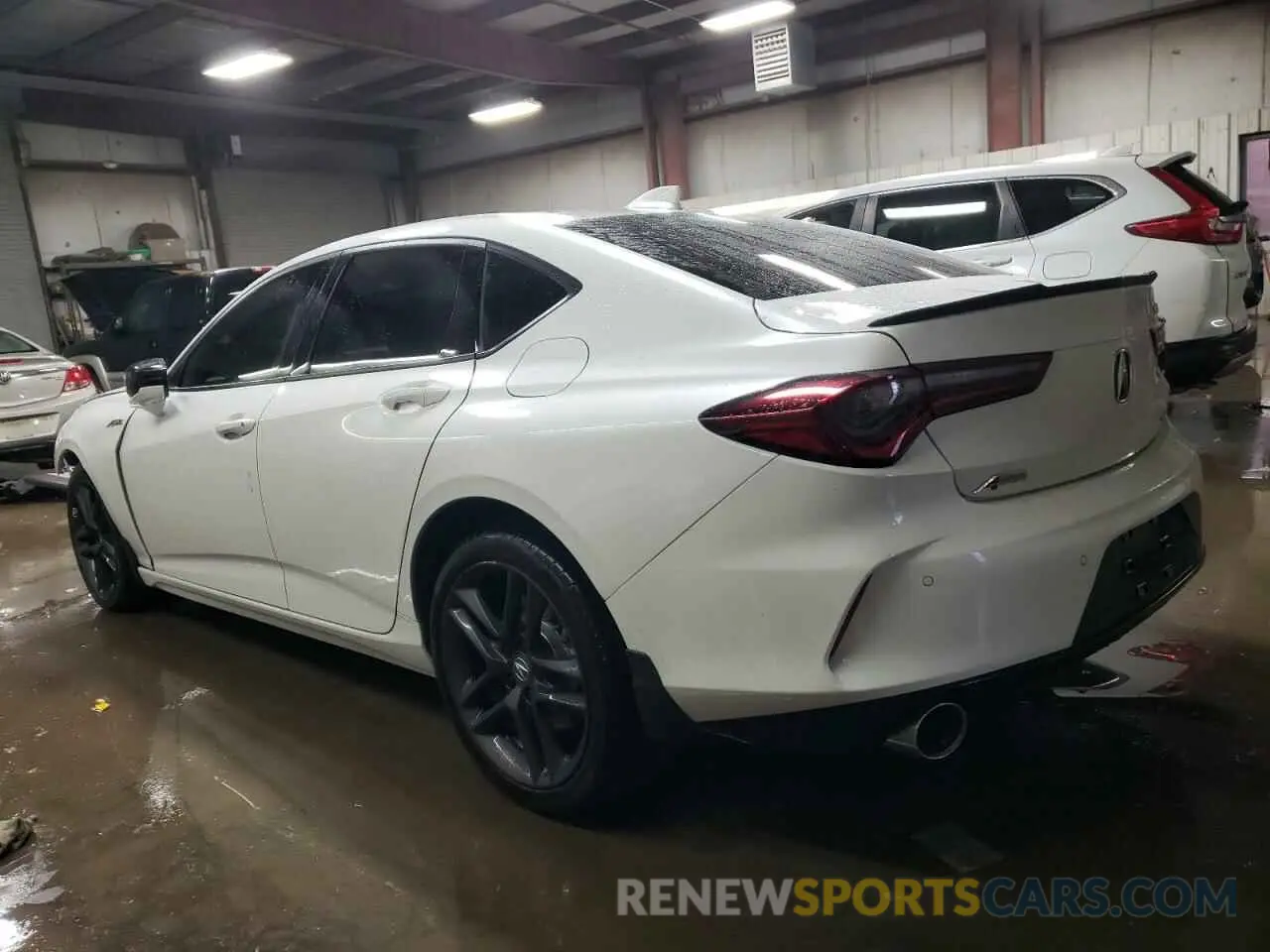 2 Photograph of a damaged car 19UUB6F5XSA000006 ACURA TLX 2025