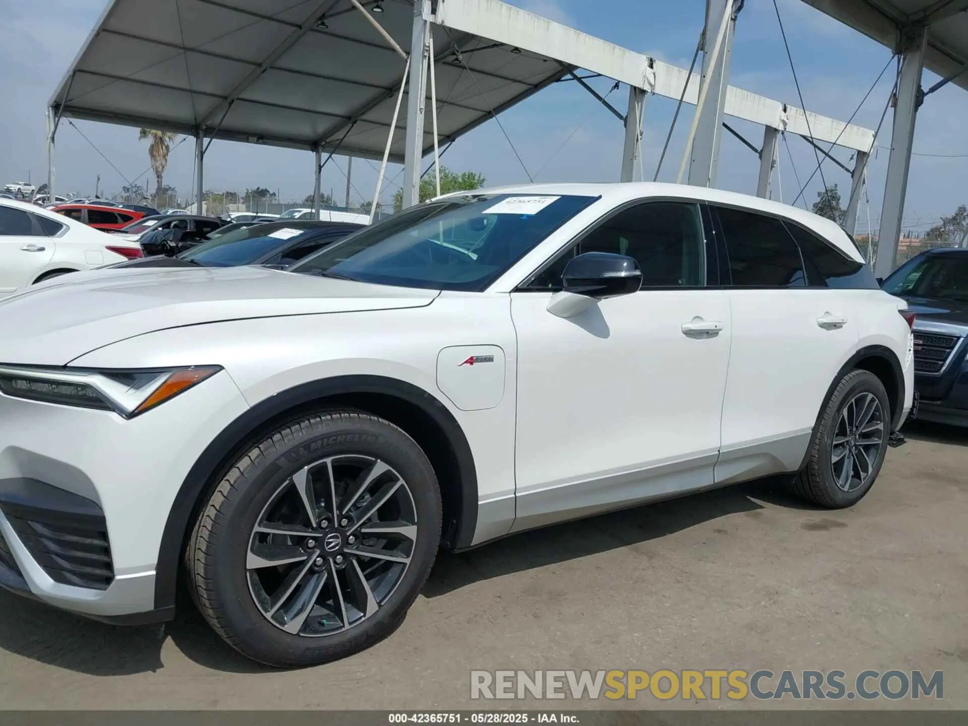14 Photograph of a damaged car 4W5KHMRK8RZ519144 ACURA ZDX 2024