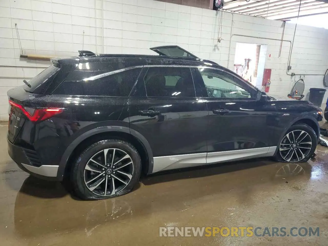3 Photograph of a damaged car 4W5KHNRL6RZ505600 ACURA ZDX A-SPEC 2024