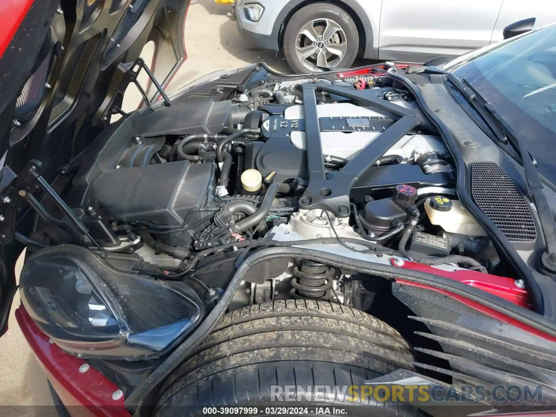 19 Photograph of a damaged car SCFRMHAV5KGR00022 ASTON MARTIN DBS 2019