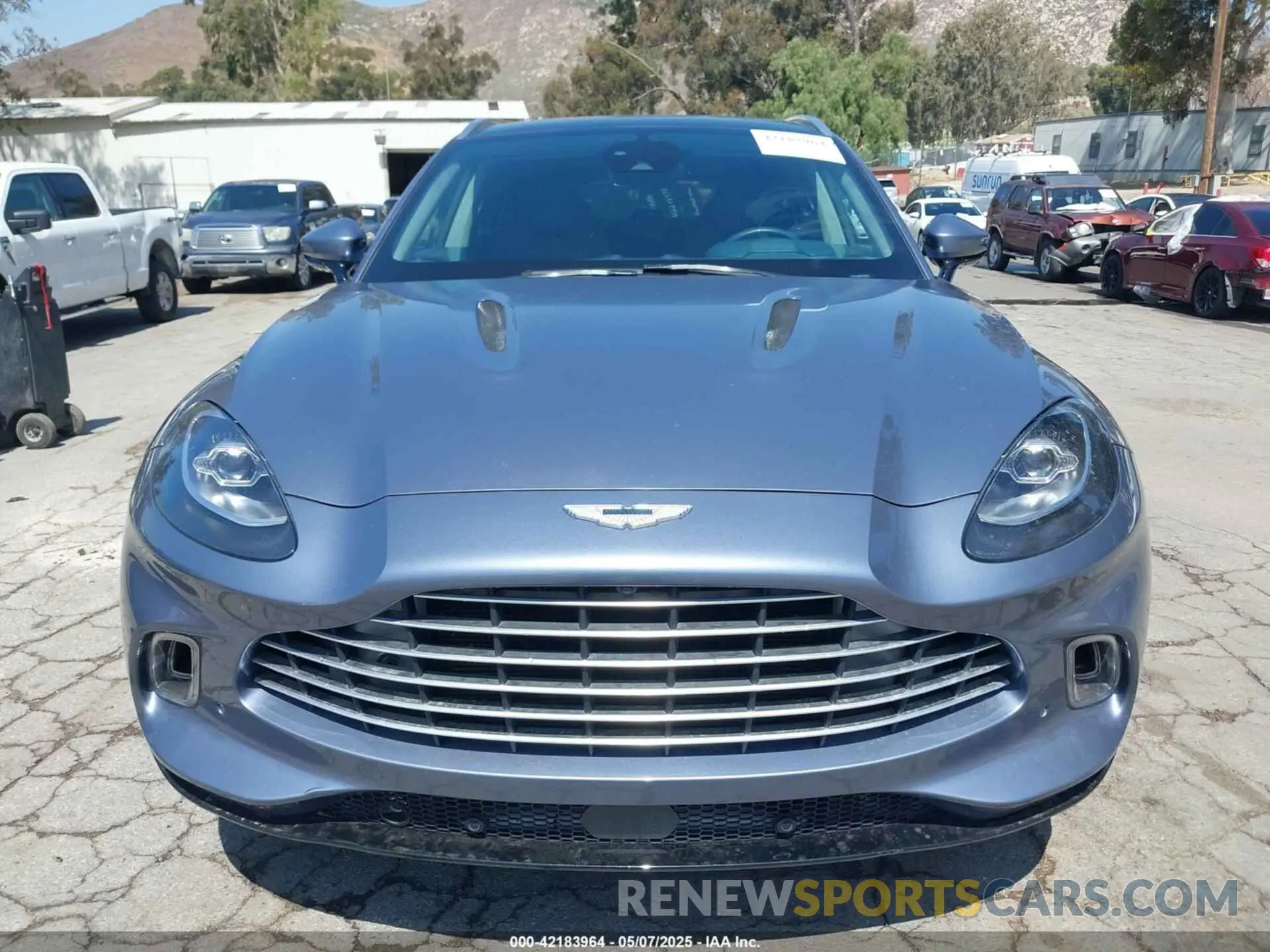 12 Photograph of a damaged car SCFVUJAW8MTV02568 ASTON MARTIN DBX 2021