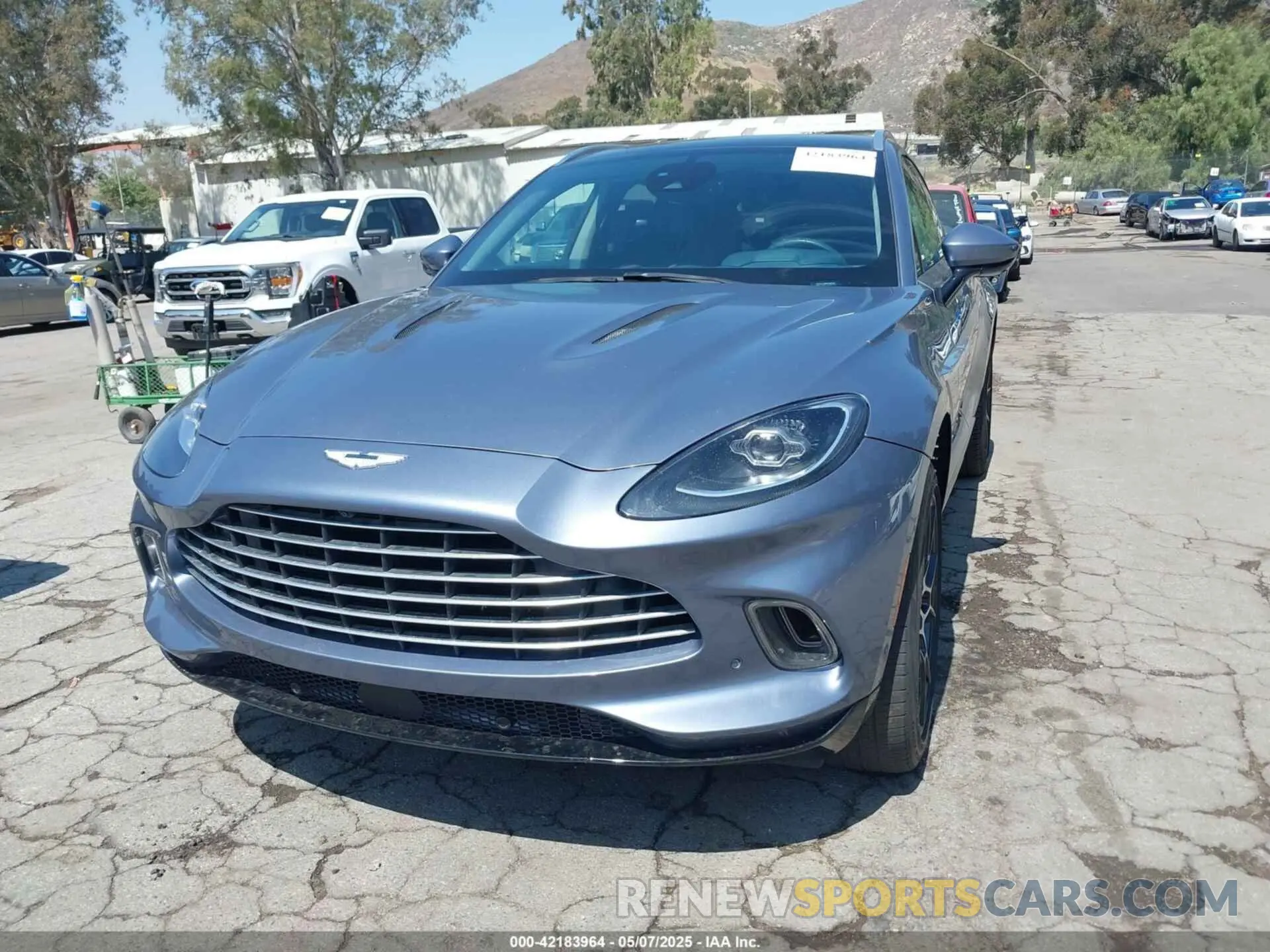 6 Photograph of a damaged car SCFVUJAW8MTV02568 ASTON MARTIN DBX 2021