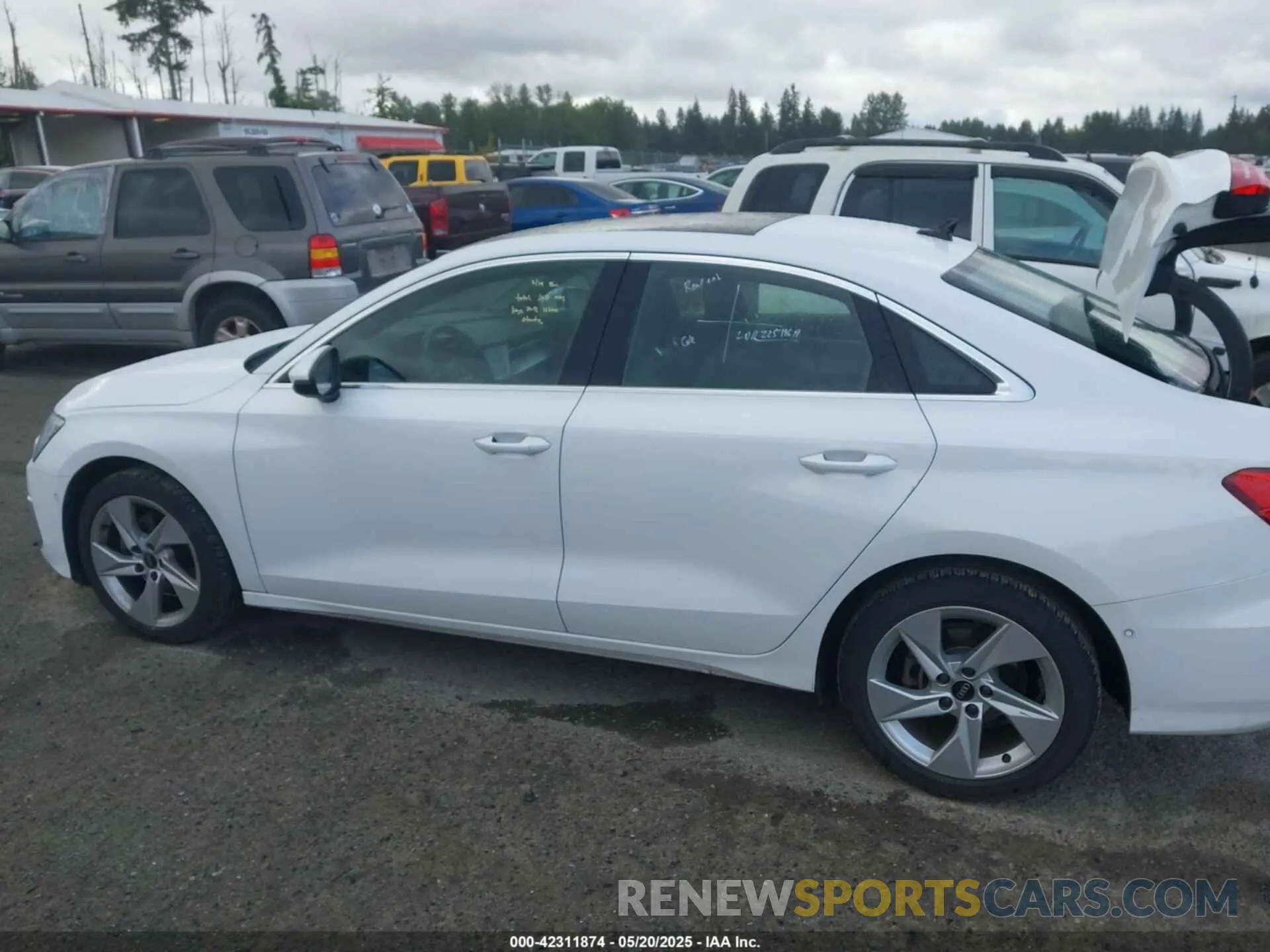 14 Photograph of a damaged car WAUAUDGYXPA118652 AUDI A3 2023