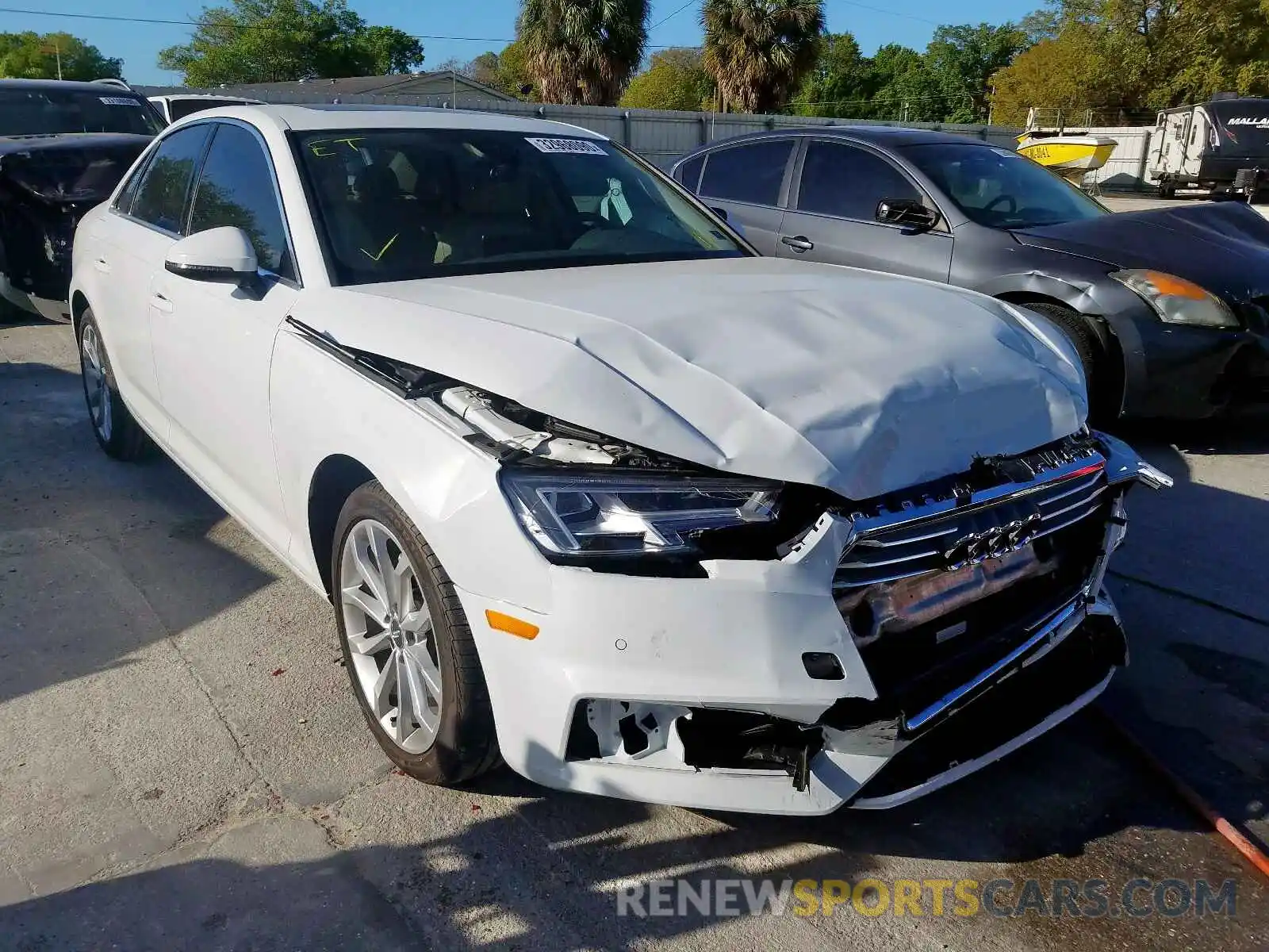 1 Photograph of a damaged car WAUHMAF47KN001933 AUDI A4 2019