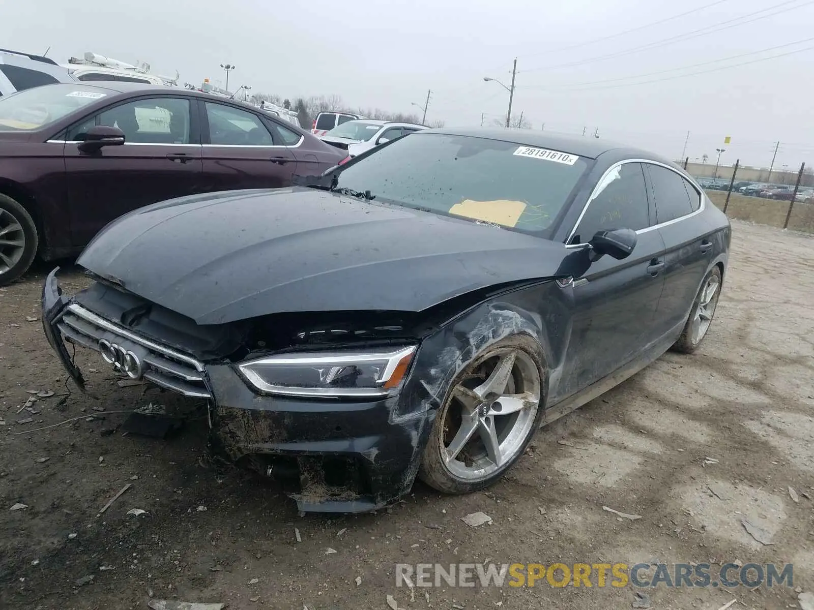 2 Photograph of a damaged car WAUENCF59KA025002 AUDI A5 2019