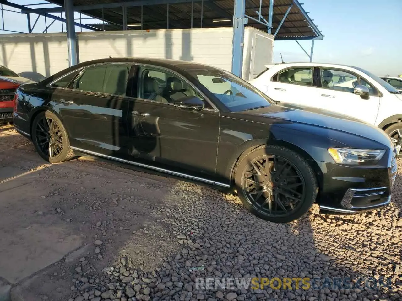 4 Photograph of a damaged car WAU8DAF88KN004021 AUDI A8 2019