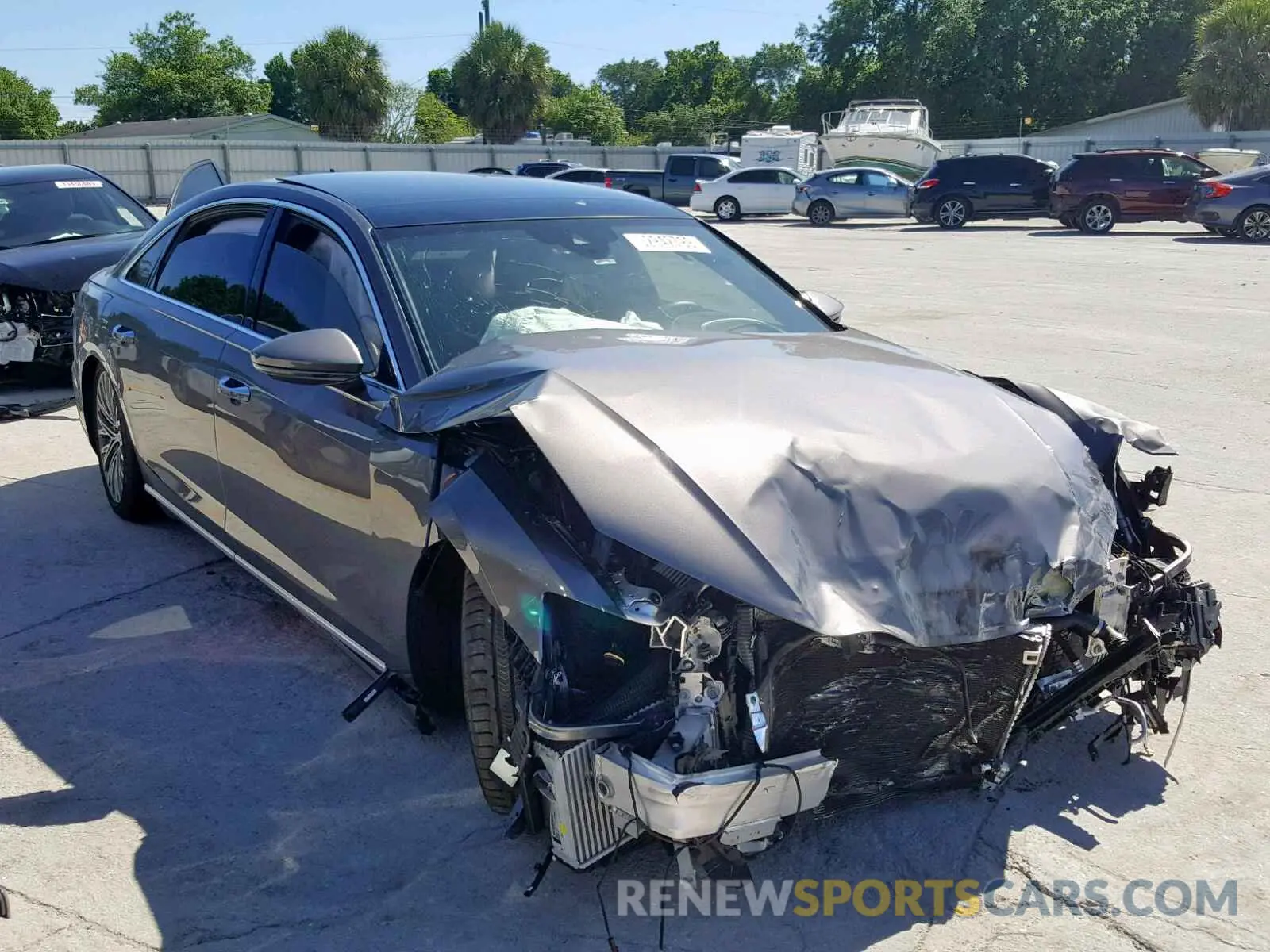 1 Photograph of a damaged car WAU8DAF88KN004312 AUDI A8 L 2019