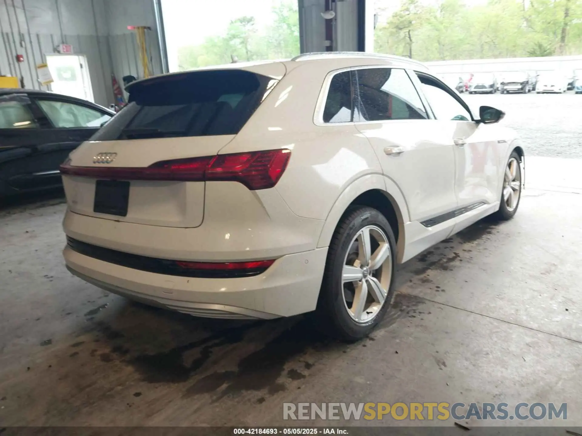 4 Photograph of a damaged car WA1LAAGE4KB023803 AUDI E-TRON 2019