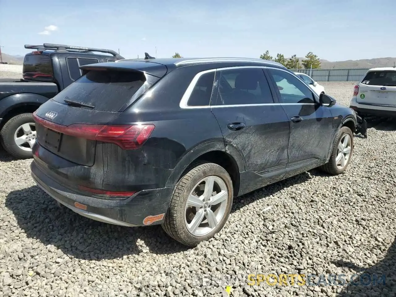 3 Photograph of a damaged car WA1LAAGE5KB014477 AUDI E-TRON 2019