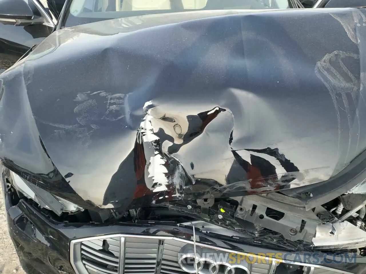 12 Photograph of a damaged car WA1VAAGE0KB008725 AUDI E-TRON 2019