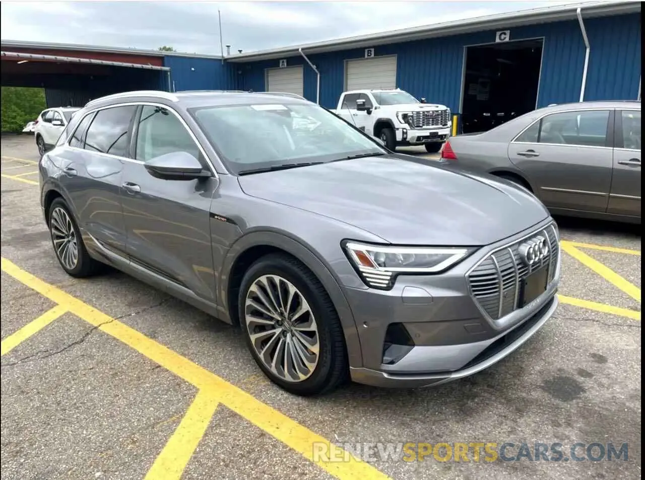 1 Photograph of a damaged car WA1VABGE0KB011XXX AUDI E-TRON 2019
