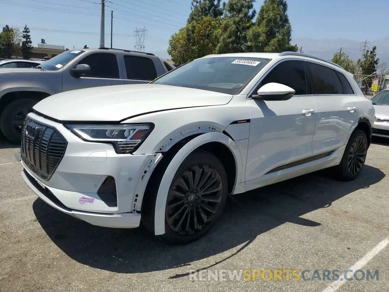 1 Photograph of a damaged car WA1VABGE8KB009661 AUDI E-TRON 2019