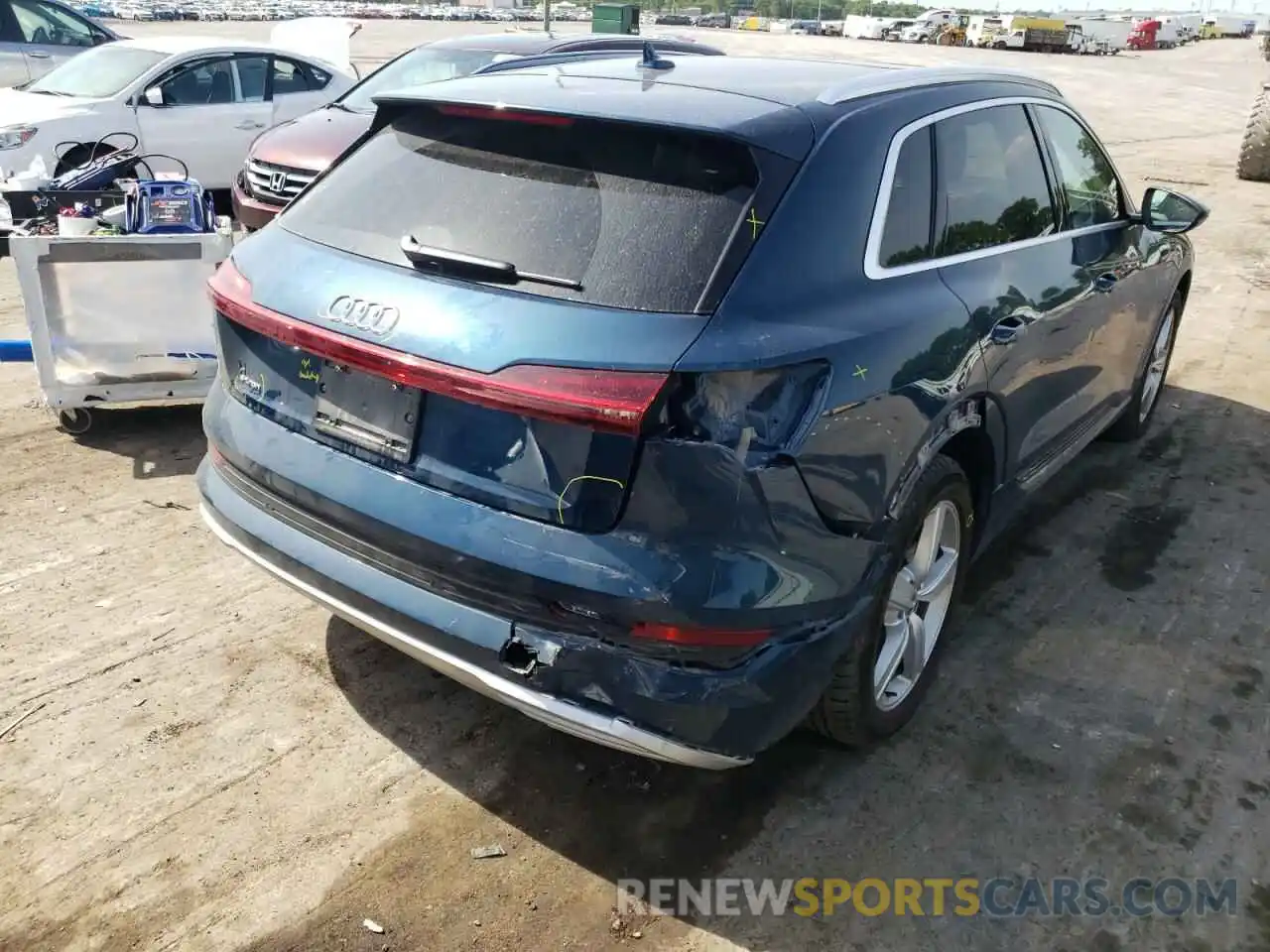 4 Photograph of a damaged car WA1VABGEXKB021553 AUDI E-TRON 2019