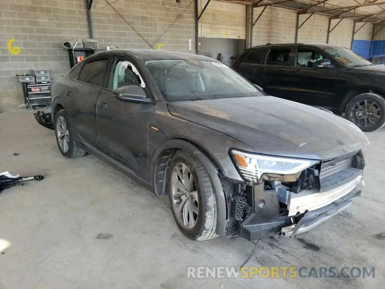 1 Photograph of a damaged car WA12AAGE0MB003823 AUDI E-TRON 2021