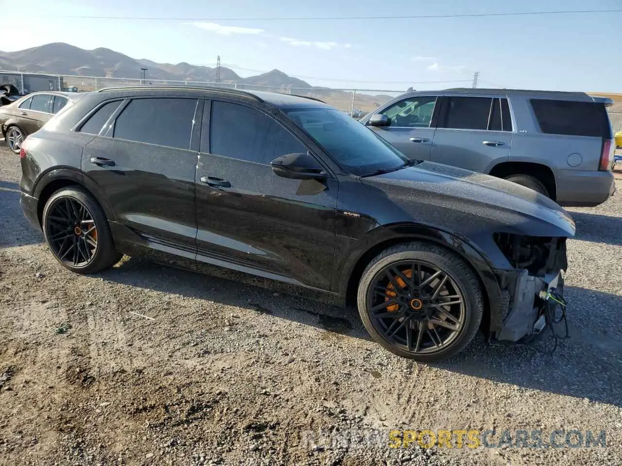 4 Photograph of a damaged car WA1AAAGE2MB023969 AUDI E-TRON 2021