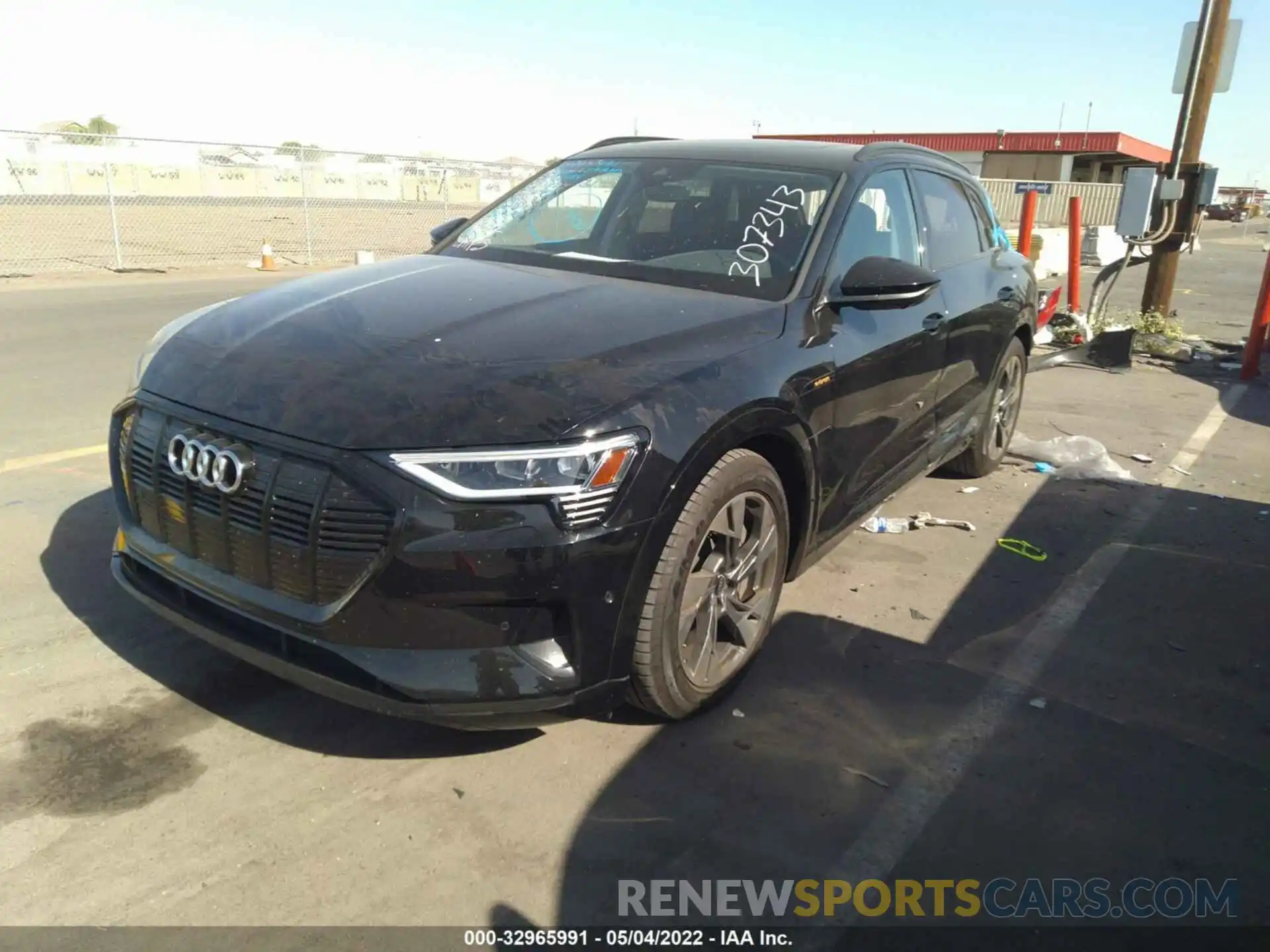 2 Photograph of a damaged car WA1AAAGE4MB006994 AUDI E-TRON 2021