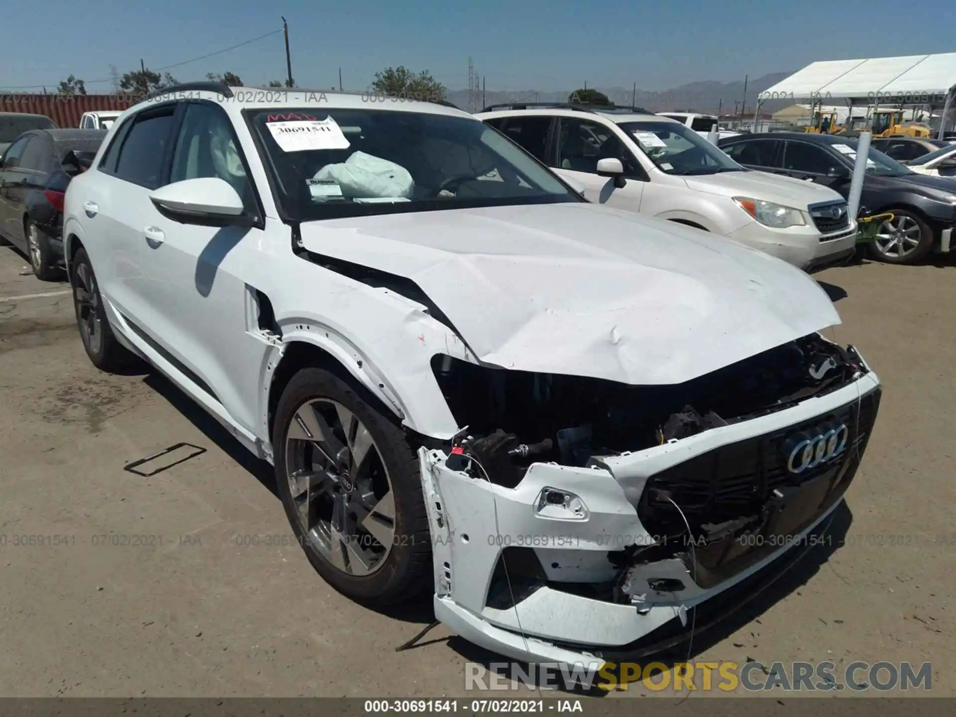 1 Photograph of a damaged car WA1AAAGE5MB013274 AUDI E-TRON 2021