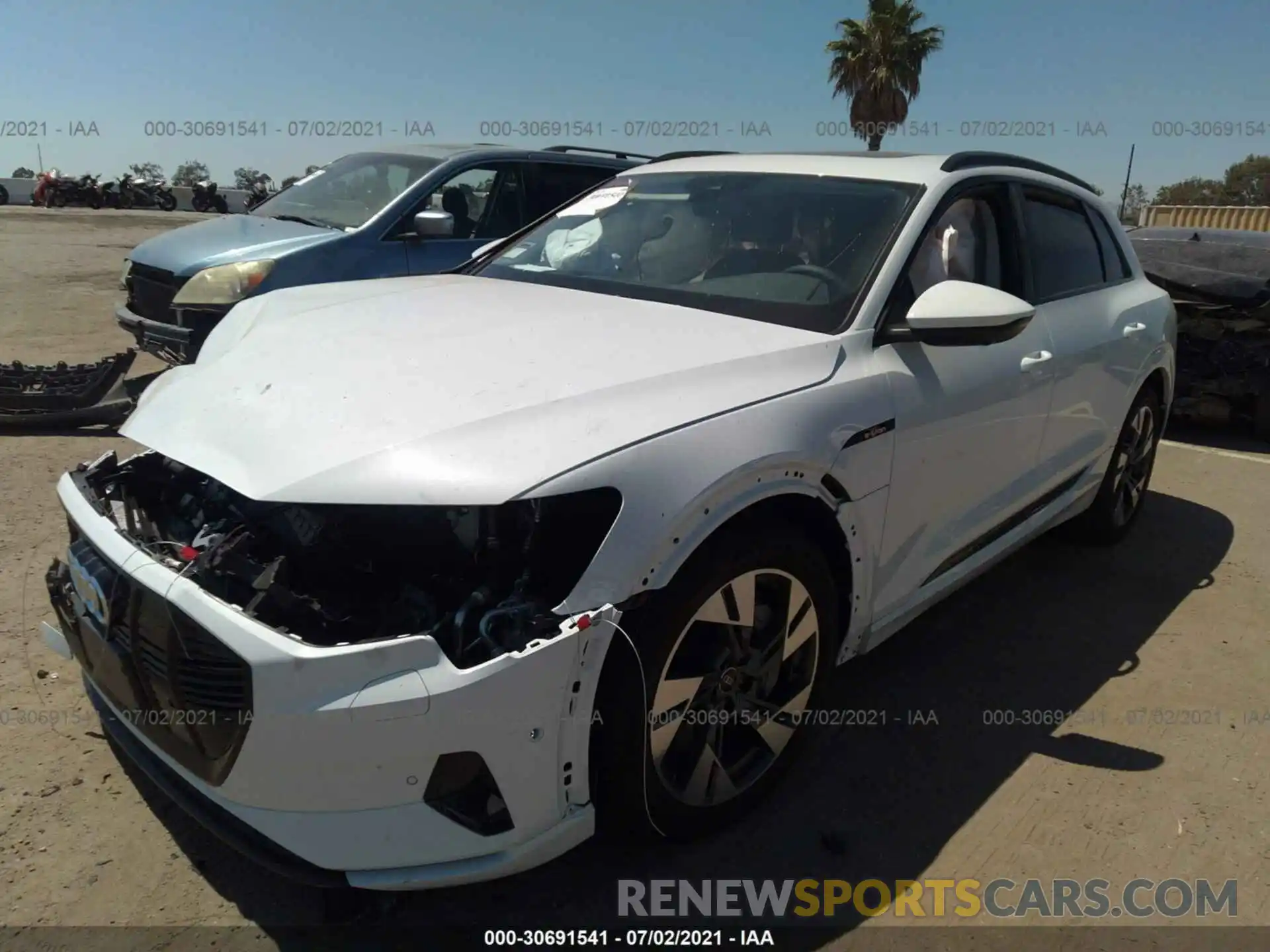 2 Photograph of a damaged car WA1AAAGE5MB013274 AUDI E-TRON 2021