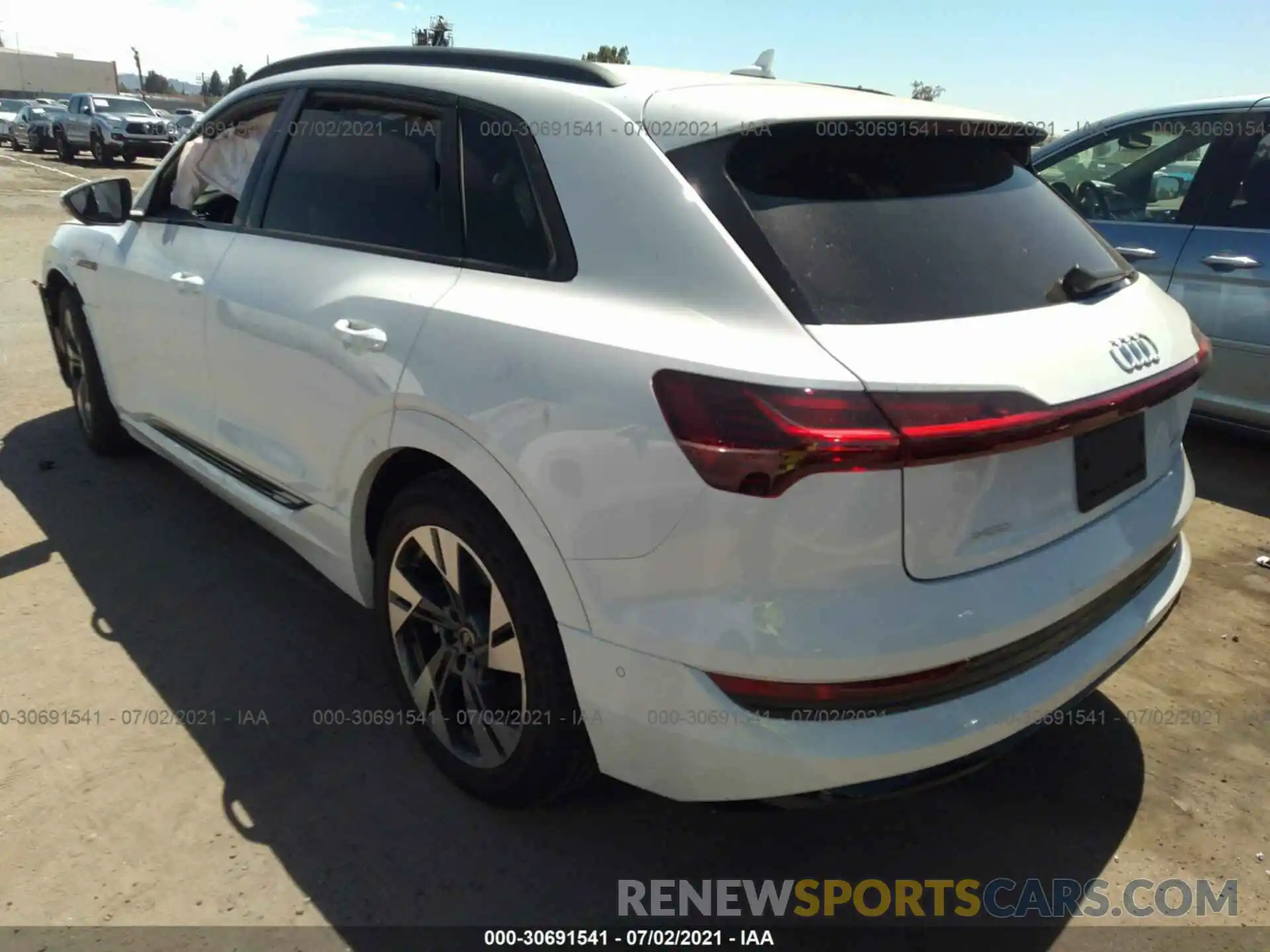 3 Photograph of a damaged car WA1AAAGE5MB013274 AUDI E-TRON 2021