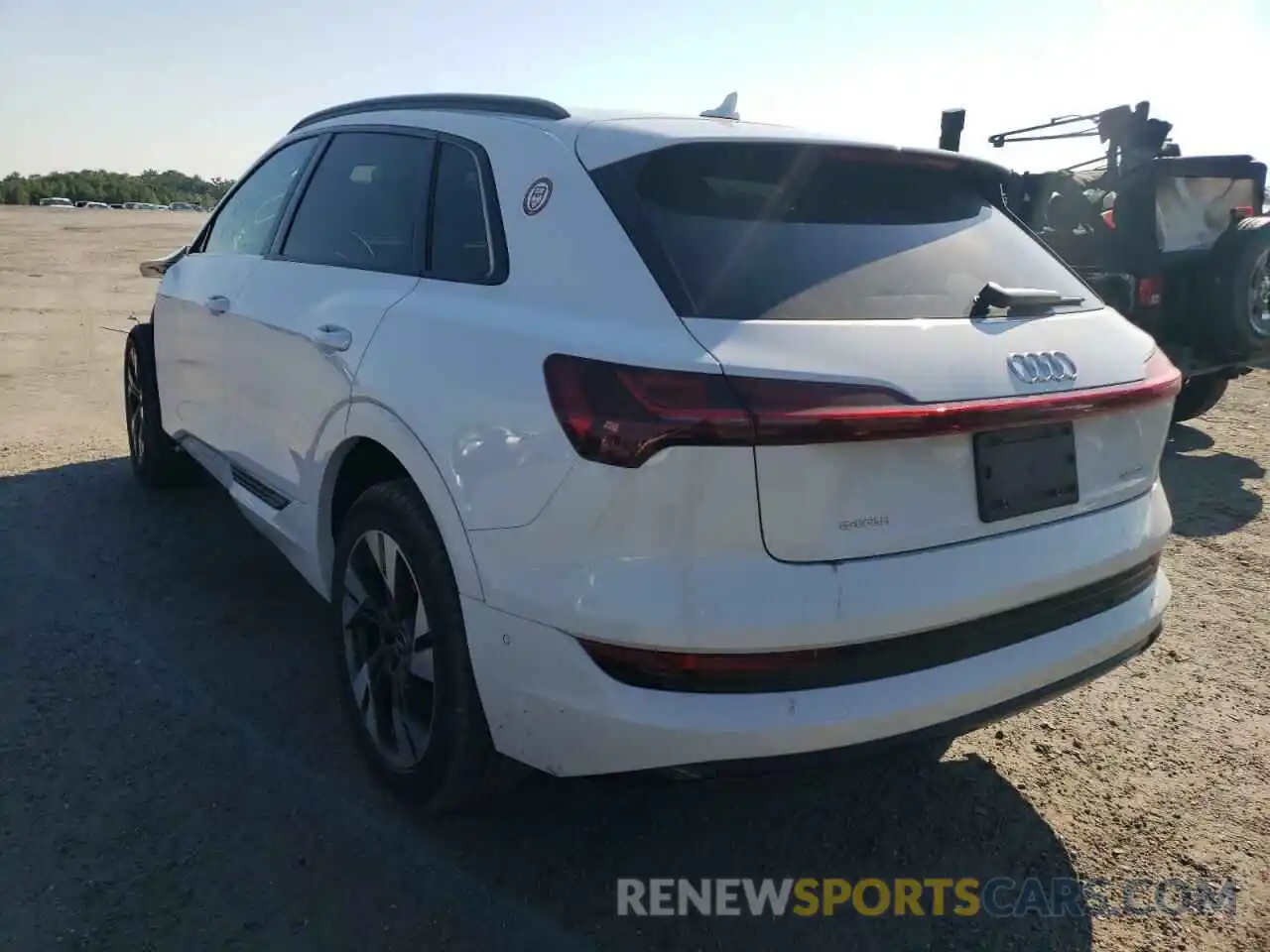 3 Photograph of a damaged car WA1AAAGE6MB010335 AUDI E-TRON 2021