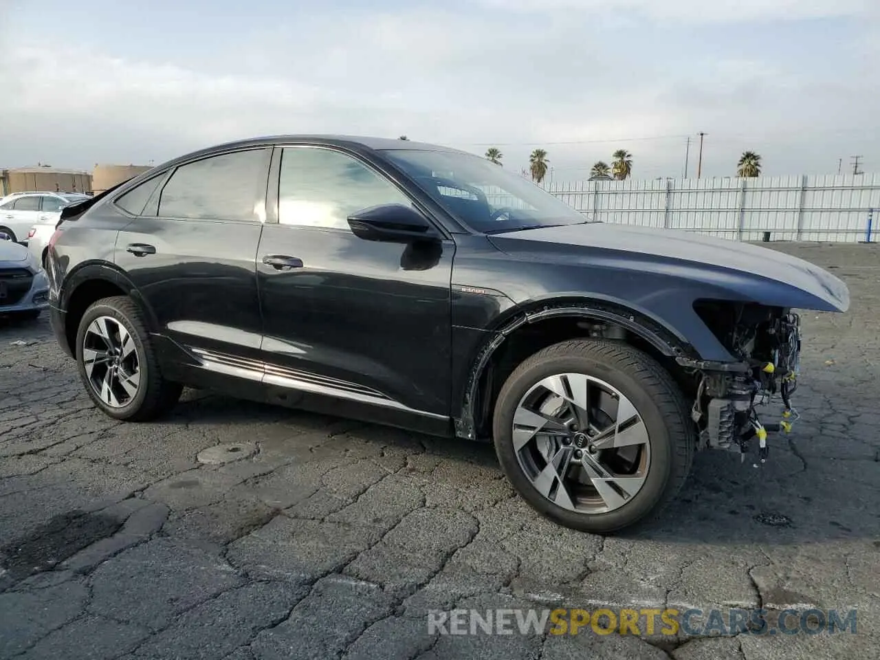4 Photograph of a damaged car WA11AAGE8NB022696 AUDI E-TRON 2022