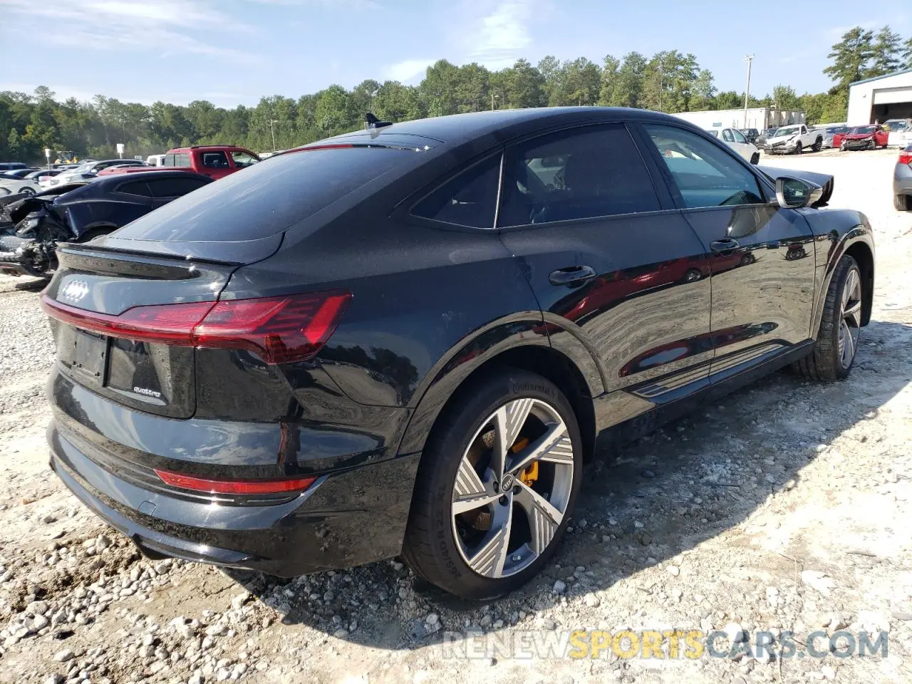 4 Photograph of a damaged car WA13AAGE5NB012295 AUDI E-TRON 2022