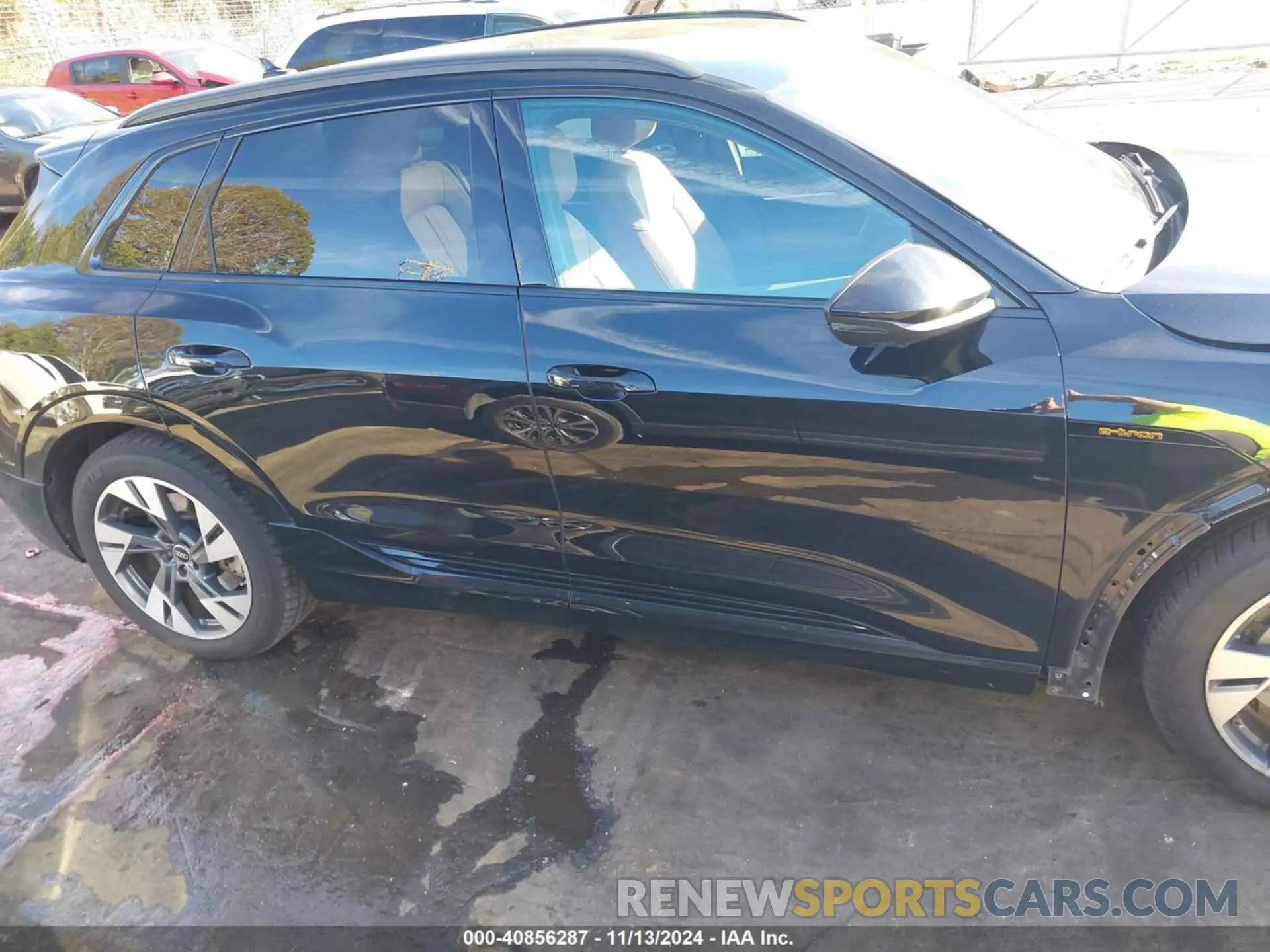 13 Photograph of a damaged car WA1AAAGE6NB029002 AUDI E-TRON 2022