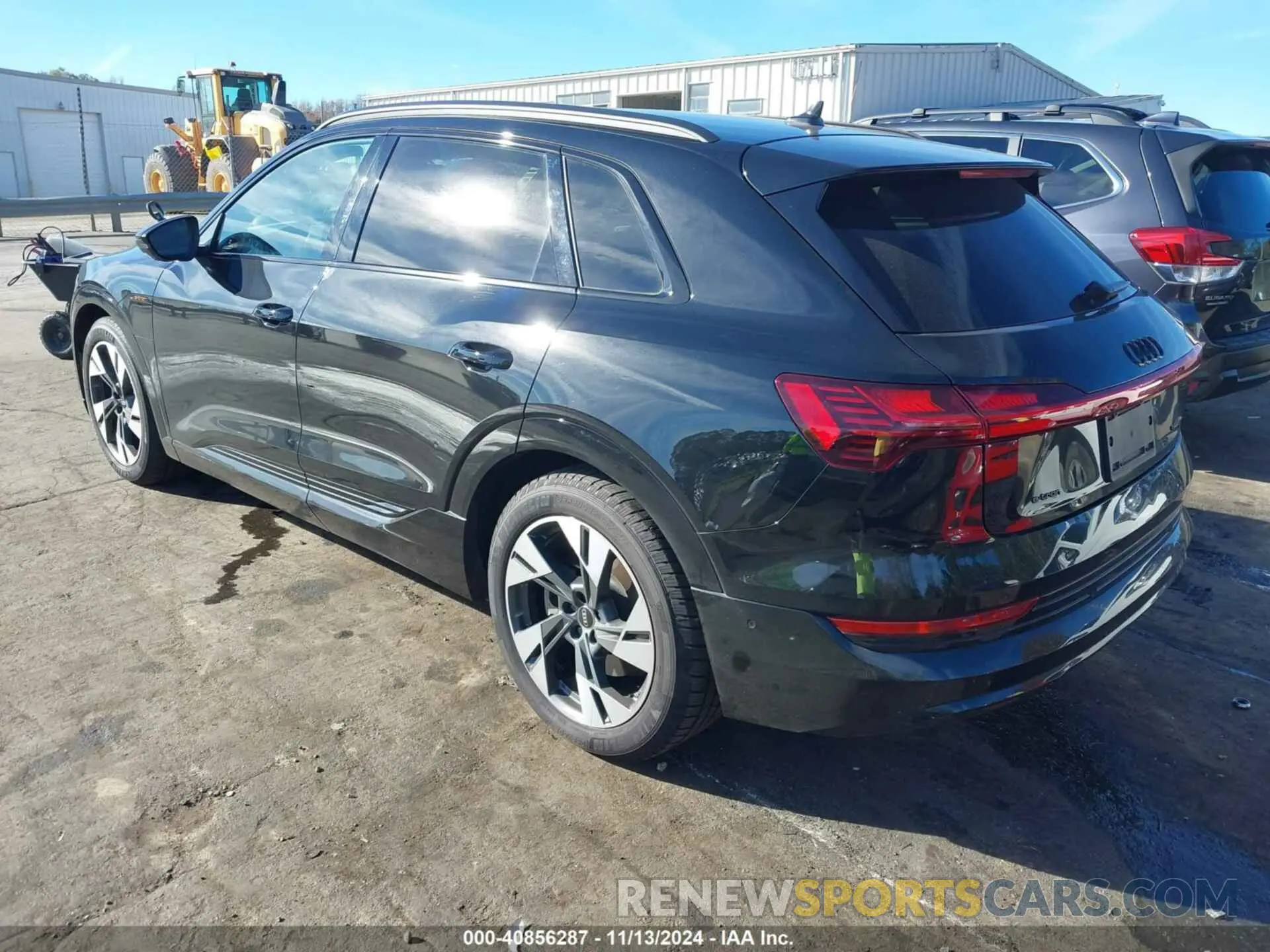 3 Photograph of a damaged car WA1AAAGE6NB029002 AUDI E-TRON 2022