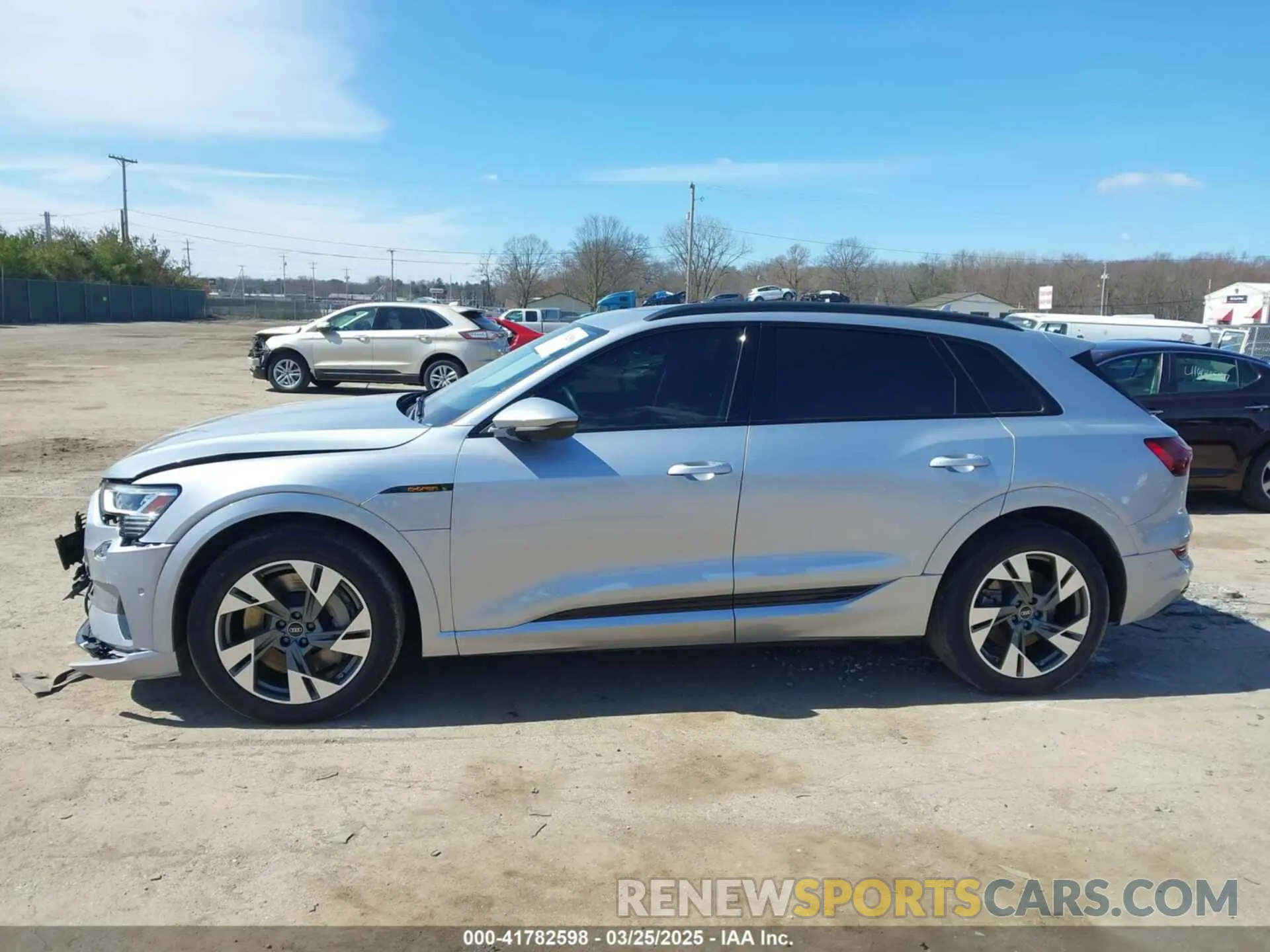 14 Photograph of a damaged car WA1AAAGEXNB047650 AUDI E-TRON 2022