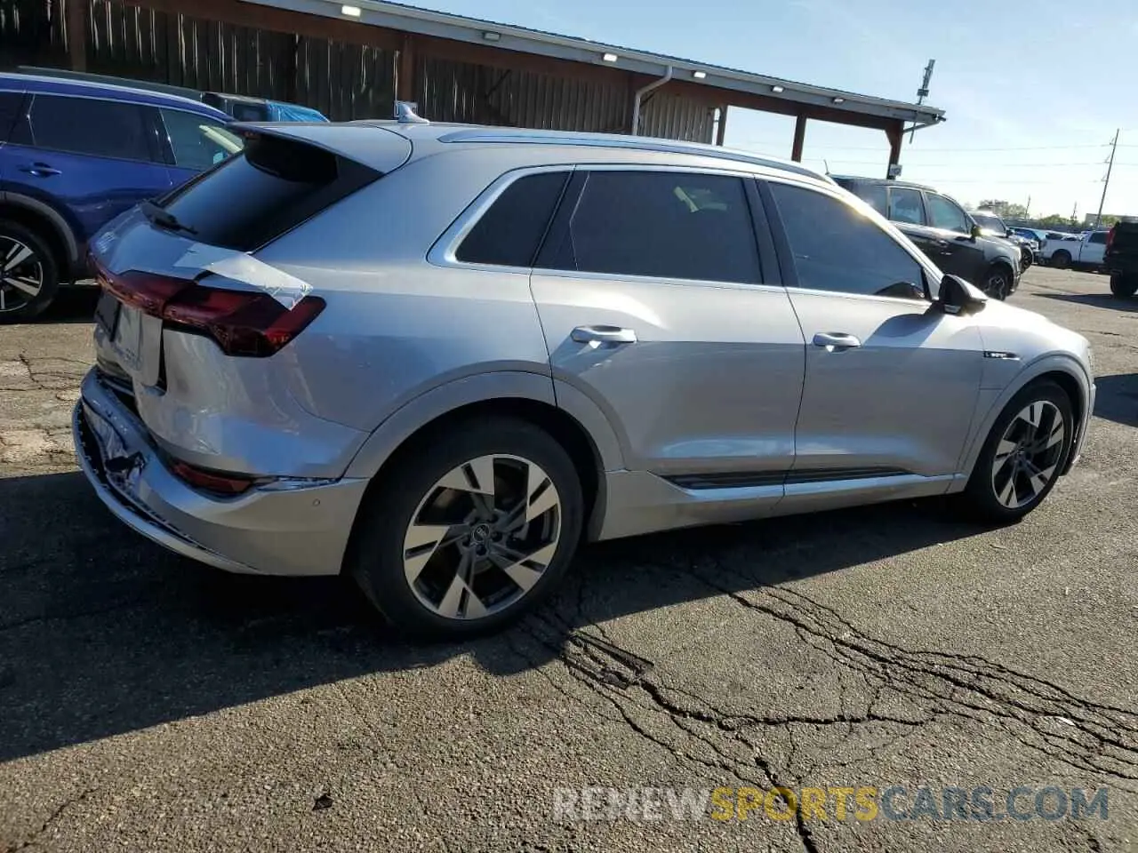 3 Photograph of a damaged car WA1LAAGE1NB026520 AUDI E-TRON 2022