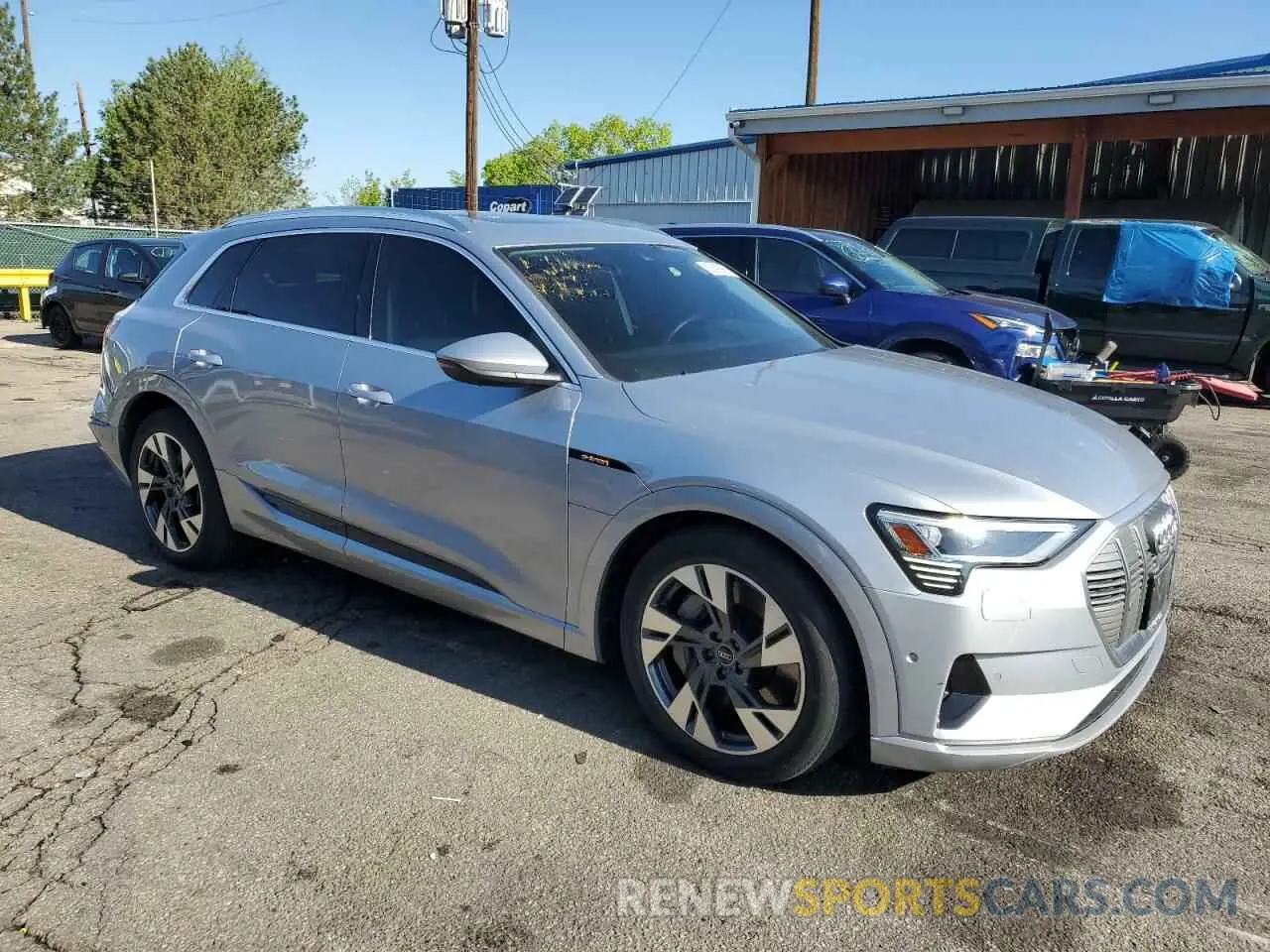 4 Photograph of a damaged car WA1LAAGE1NB026520 AUDI E-TRON 2022