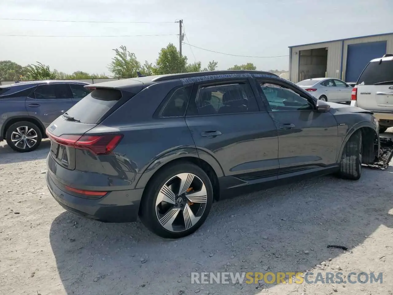 3 Photograph of a damaged car WA1LAAGE6NB010328 AUDI E-TRON 2022