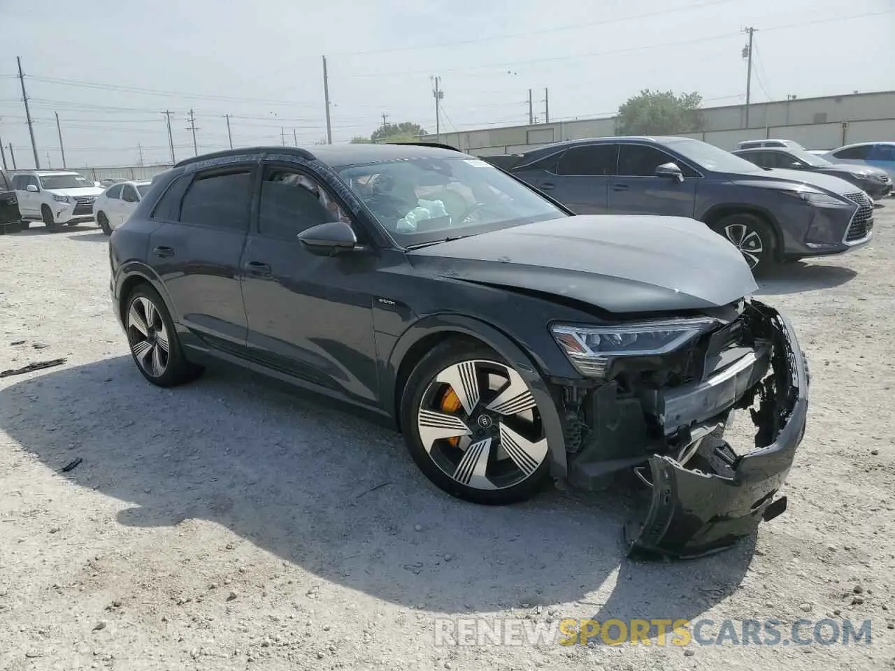 4 Photograph of a damaged car WA1LAAGE6NB010328 AUDI E-TRON 2022